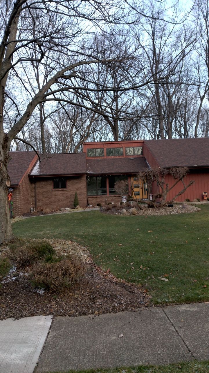 Residential Roof Replacement by Absolute Roofing and Construction