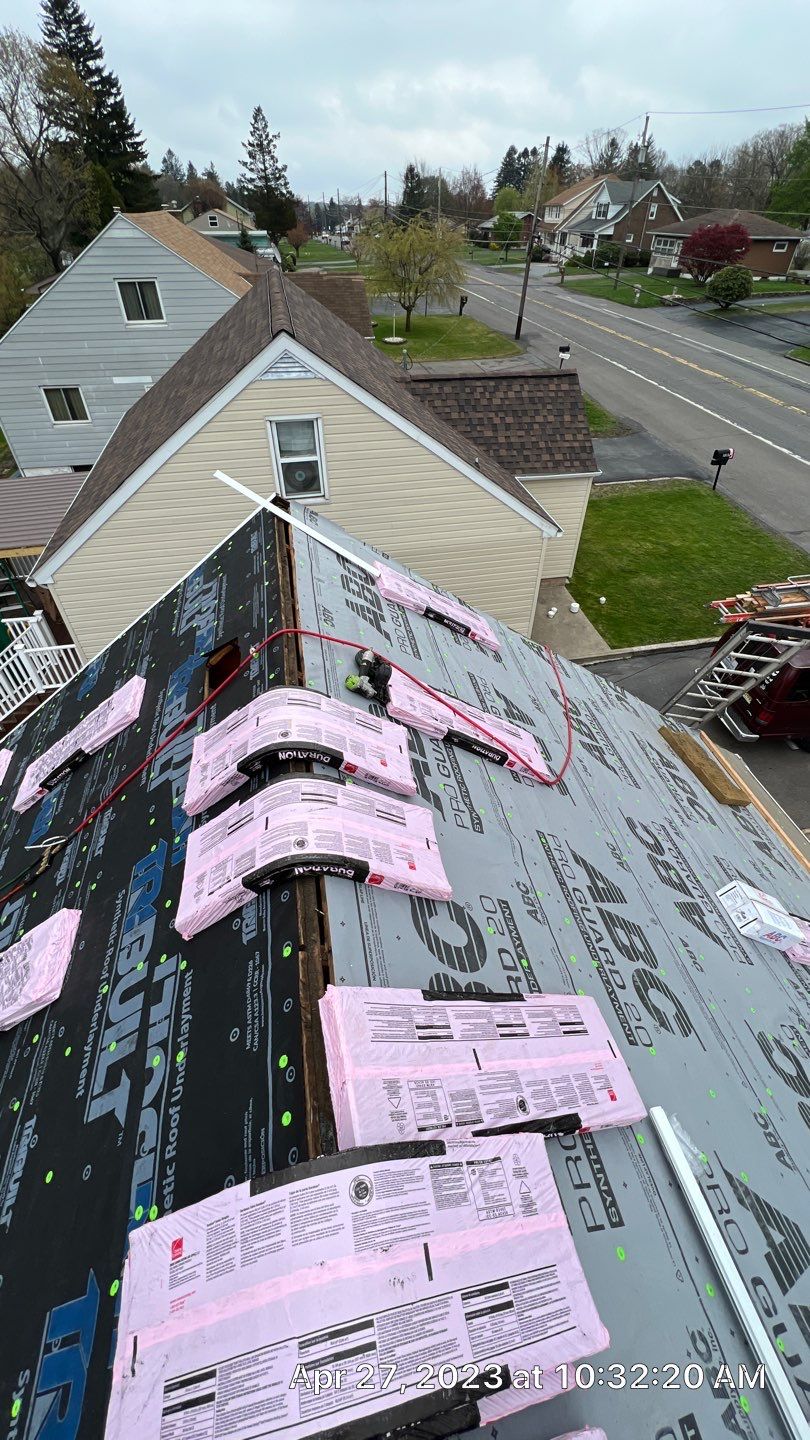 Estate Gray Shingles by Reimagine Roofing