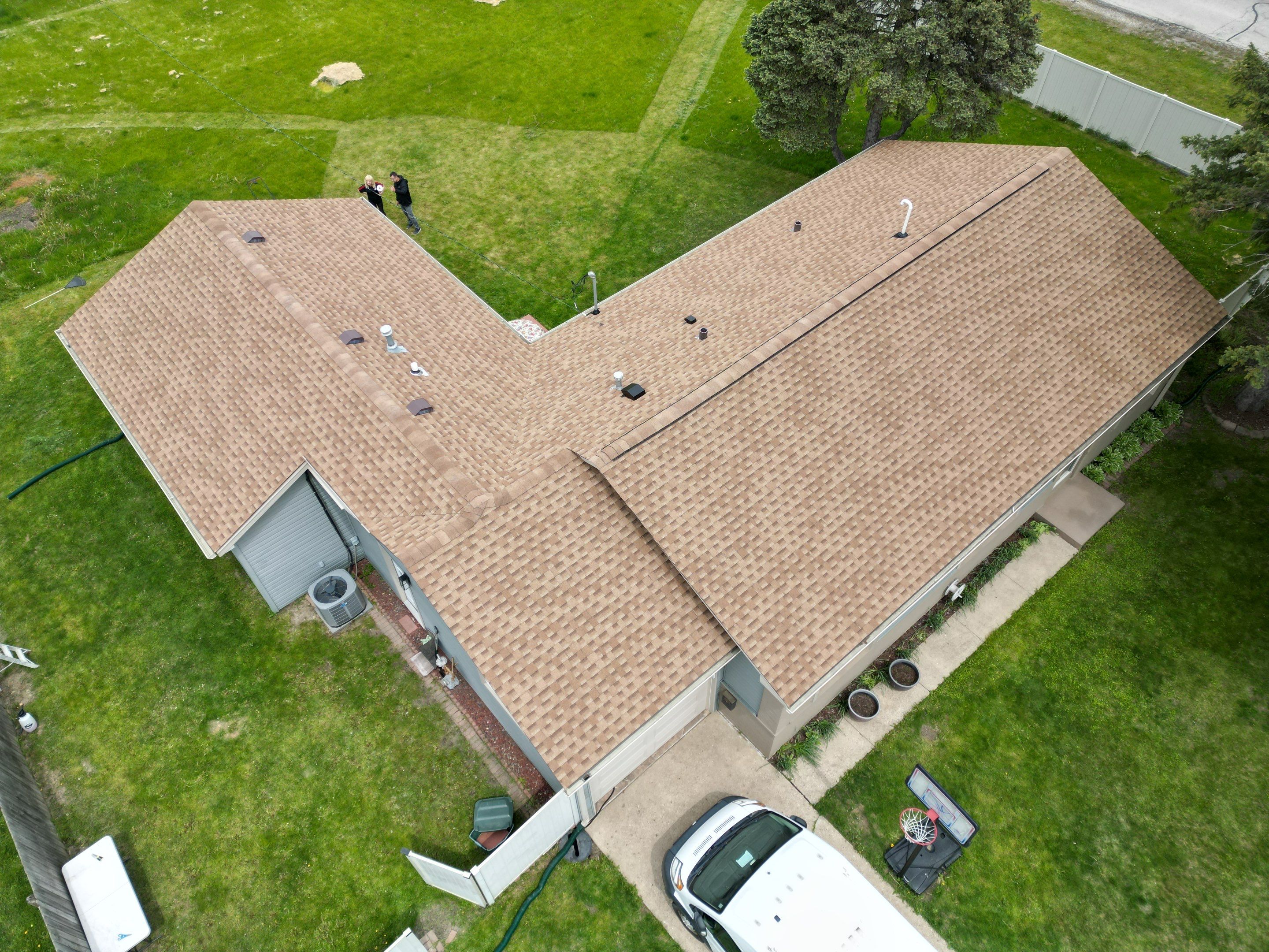 Roof replacement by Optimal Home Improvement 
