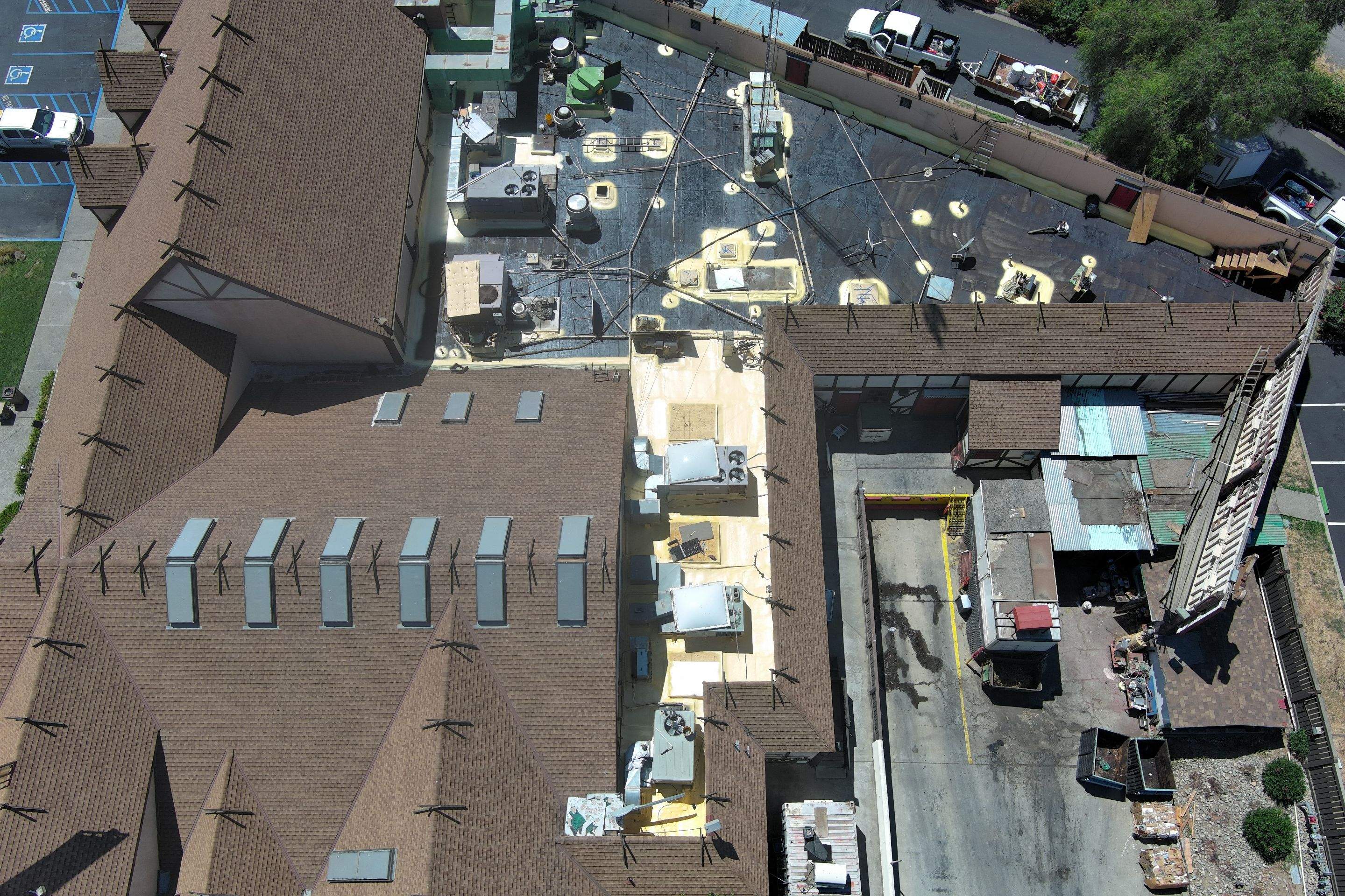 Spray foam and coatings using General Coatings acrylic coatings and spray foam by Straight Edge Roofing Inc