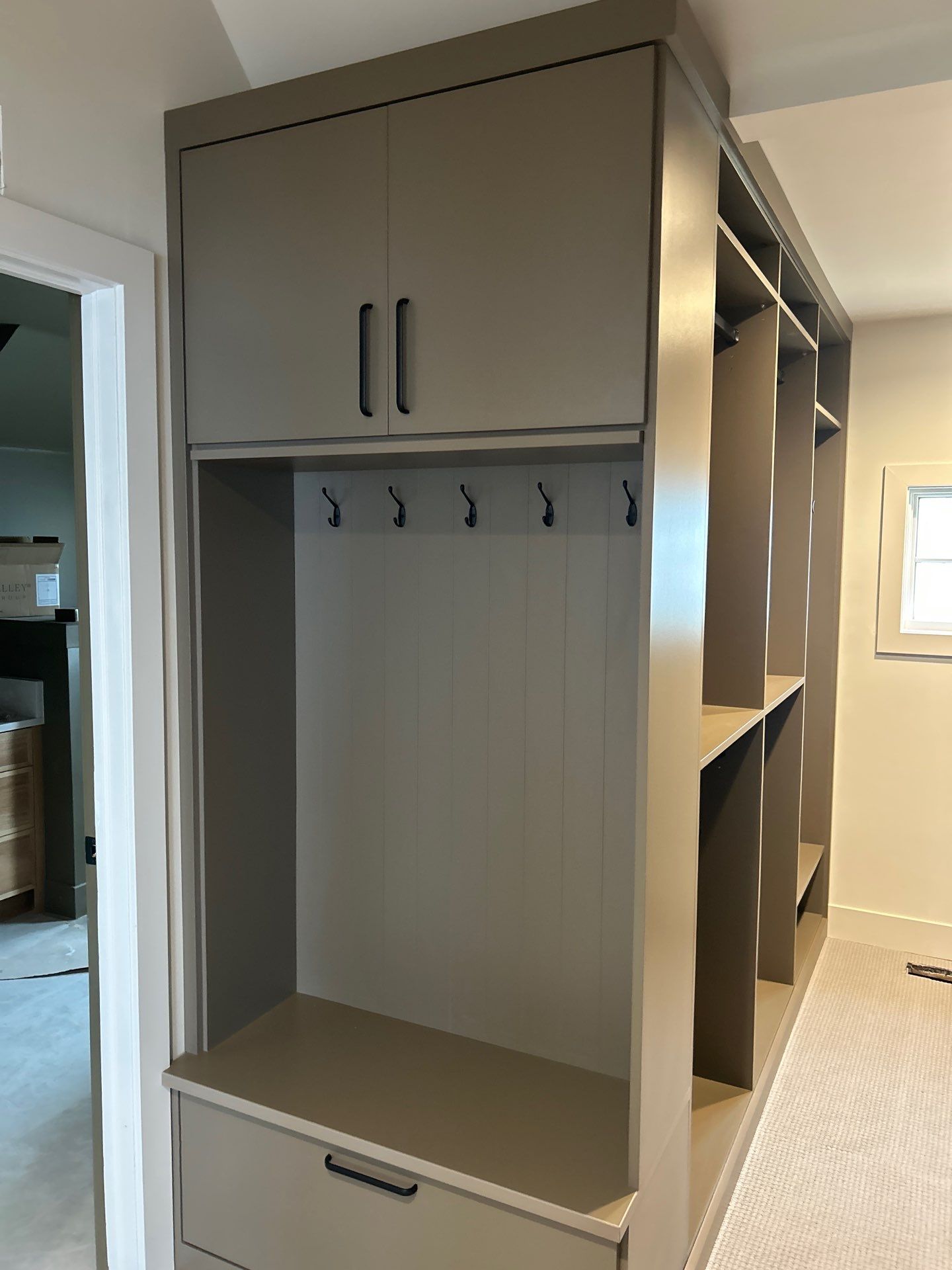 Enjoy a Morning Latte in this Walk-in Closet by Concept 32, Inc.