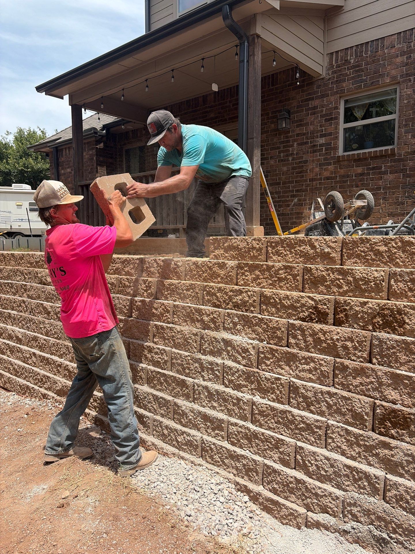 Custom Segmental Block Retaining Wall and Sod Installation in Lawton by Clays Services Inc
