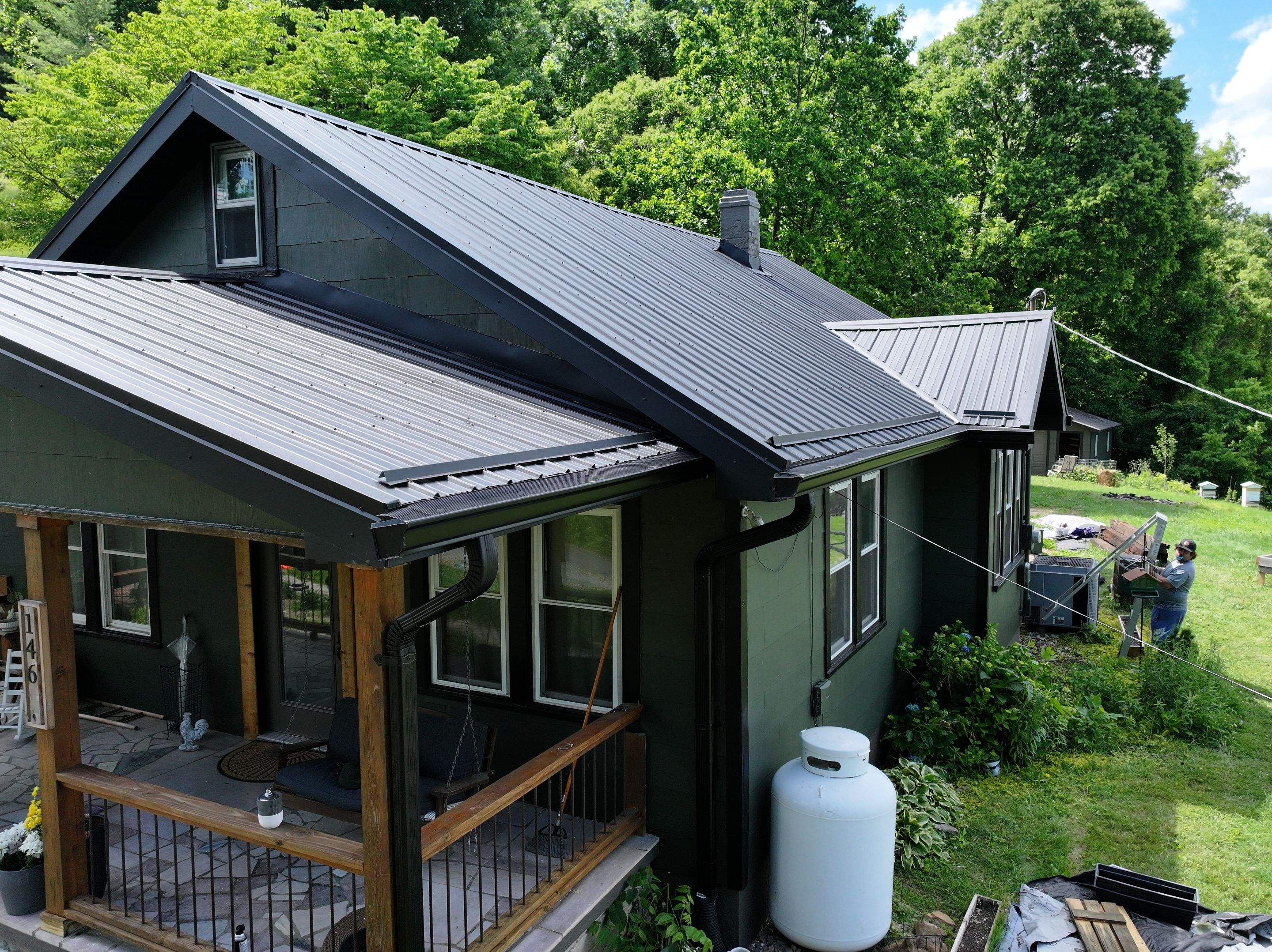 Textured Black Metal Roof by Omnia Roofing