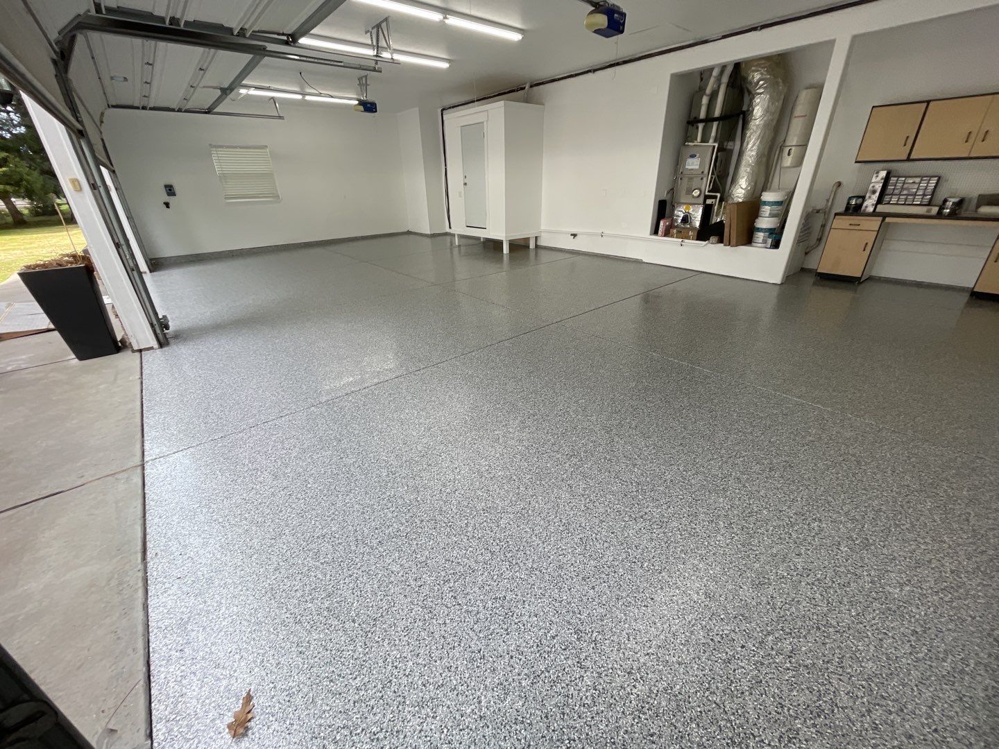 Garage Transformation using Slate Stone by Croc Coatings, LLC