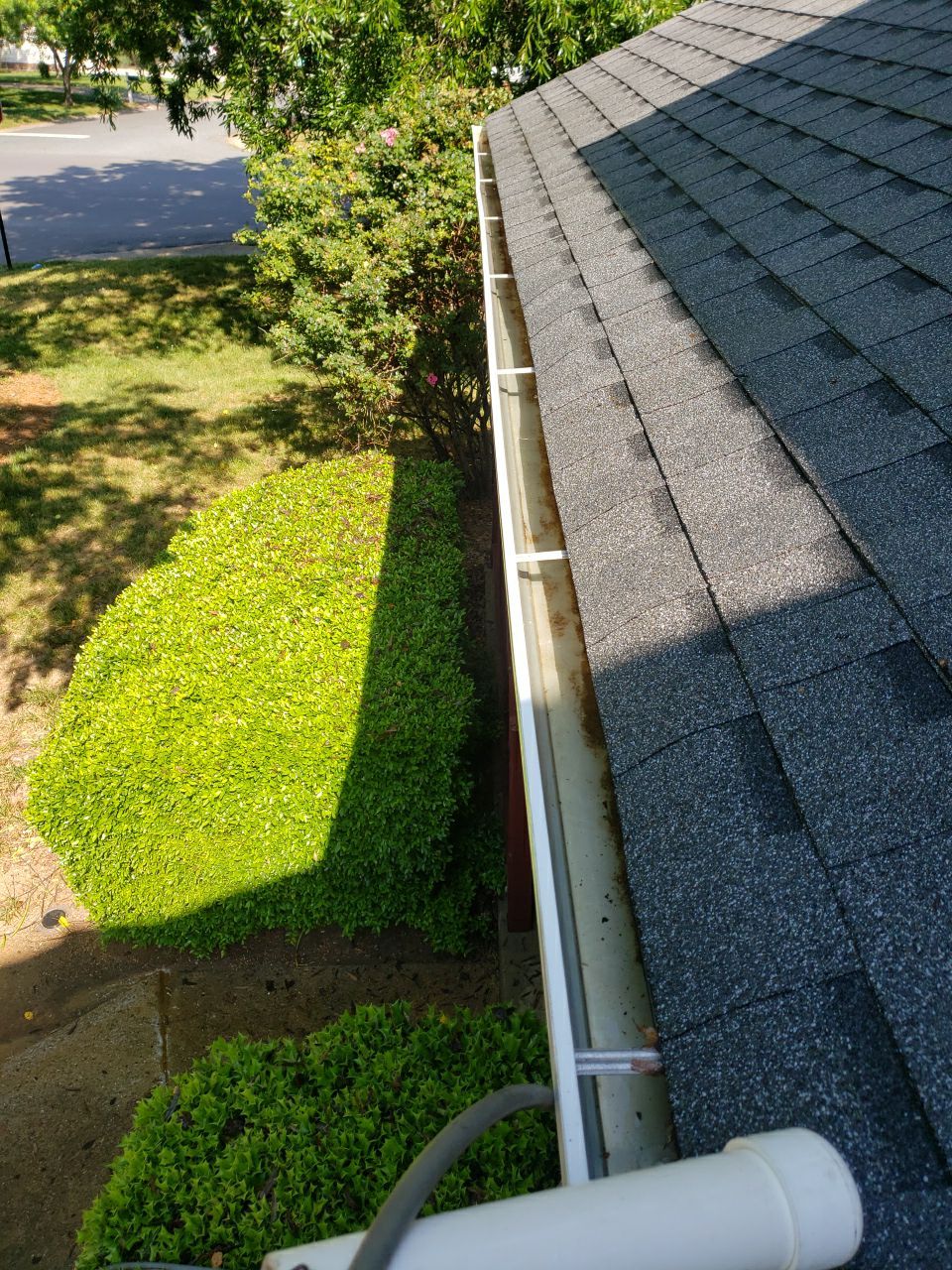 Gutter Cleaning using water by Power Wash Masters LLC