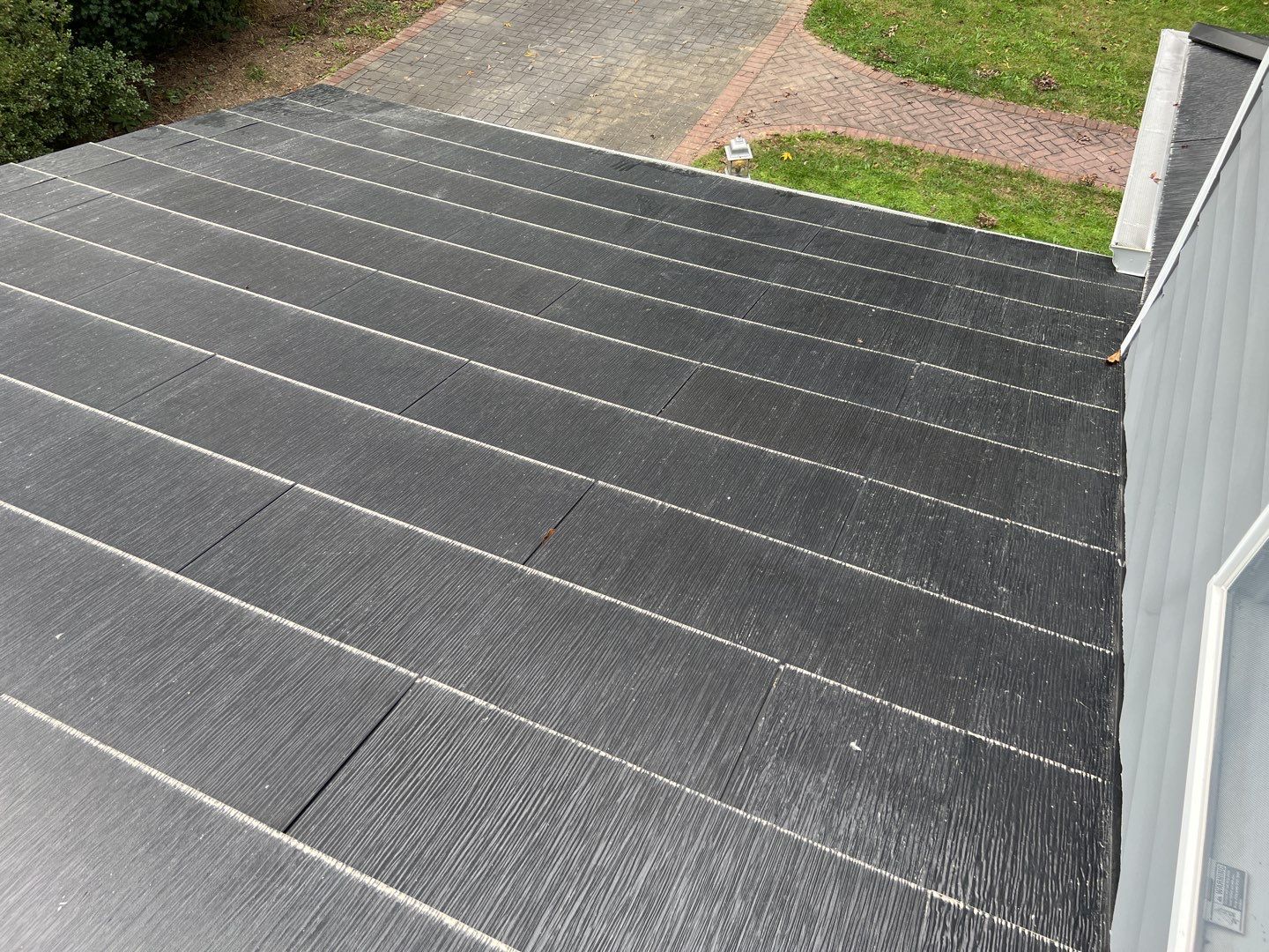 Tesla Solar Roof Replacement using Tesla Solar Roof V3 Tiles by American Home Contractors