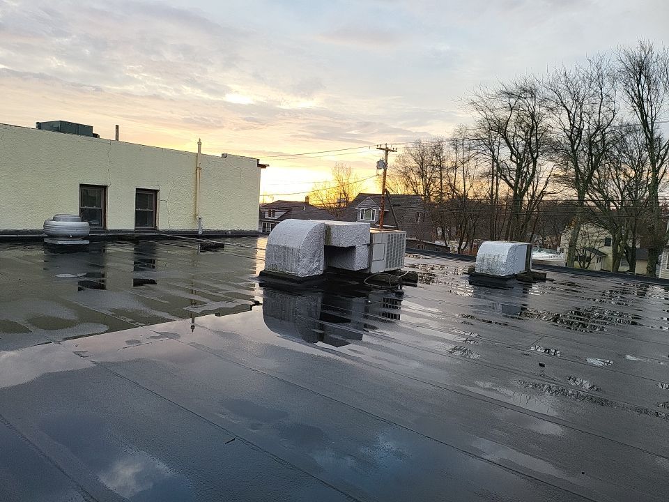 Commercial Roofing Installation using EPDM  by A Plus Exterior