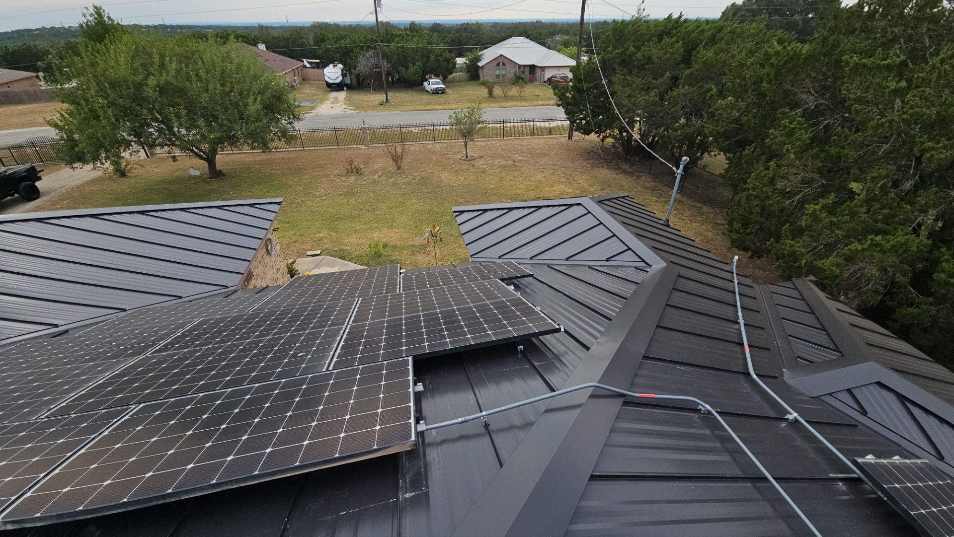Residential Roof Replacement using 24 GA Double-Lock - Matte Black by Action Exteriors Austin