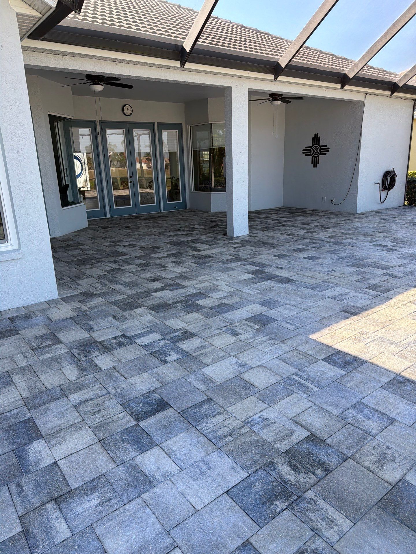Paver Sealing and Restoration for Screened Lanai in Sun City Center by Supreme Paver Experts