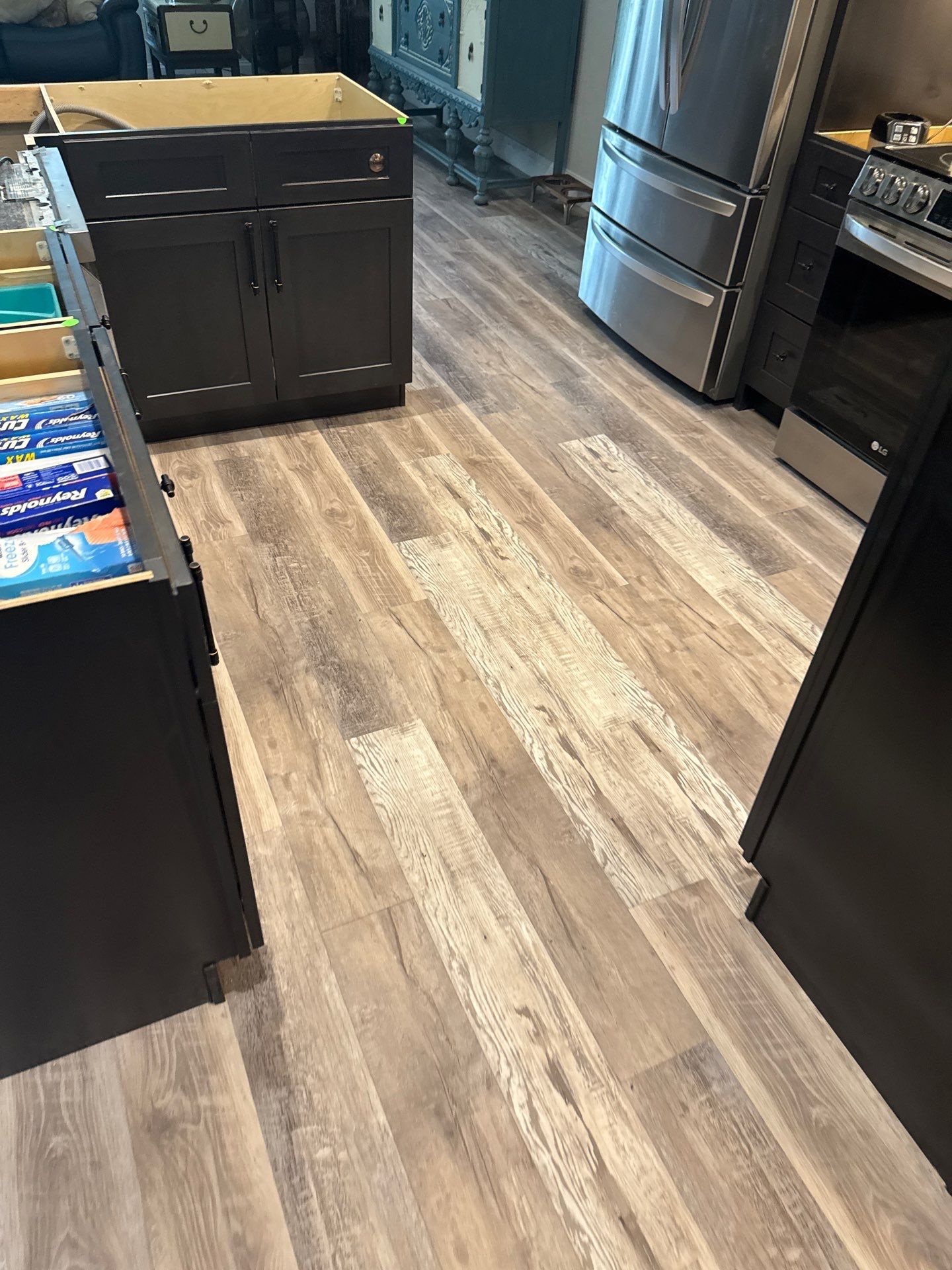 LVP kitchen floor upgrade by Vrmmm Flooring