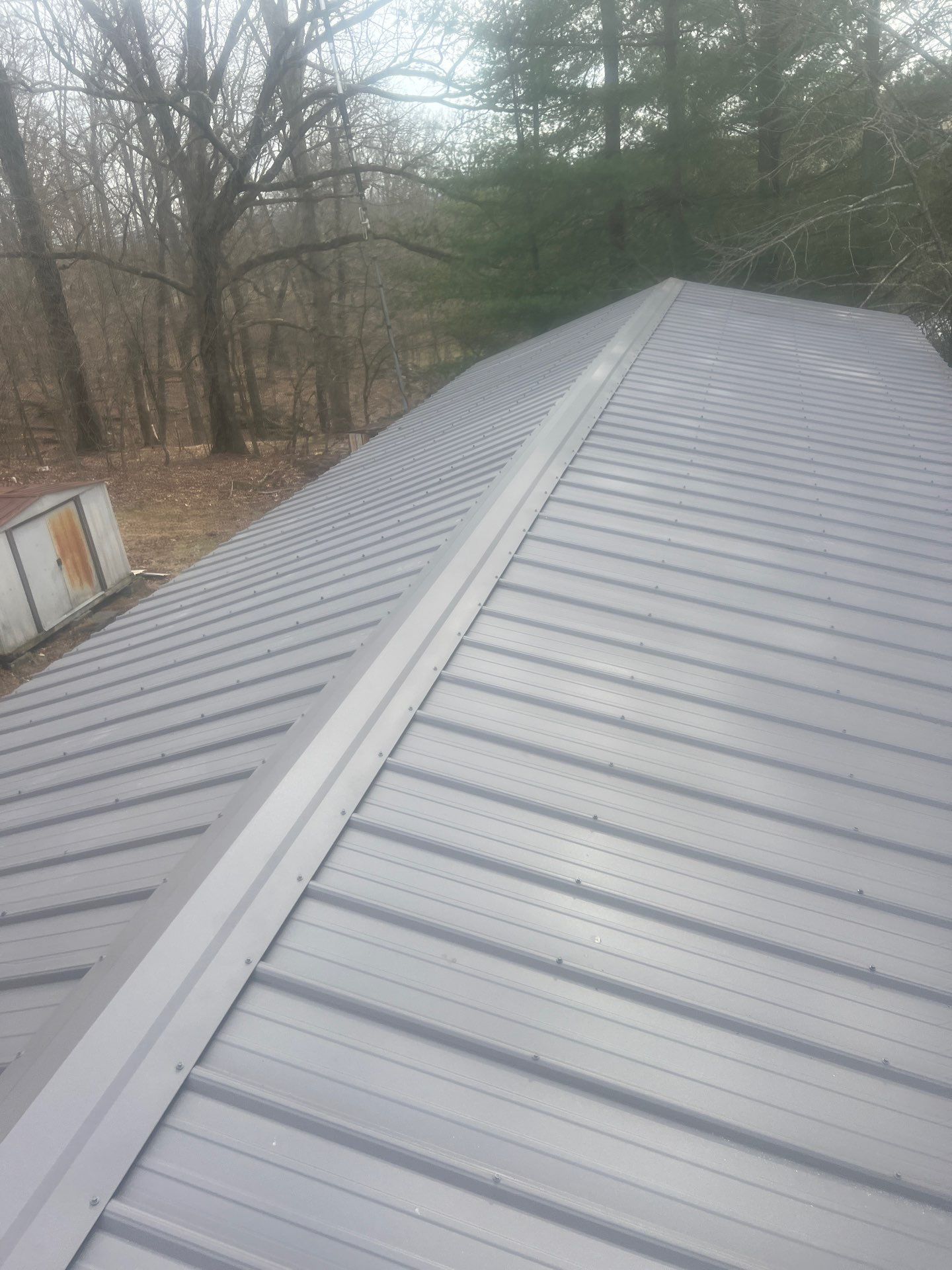 Textured Charcoal Gray using 29 Gauge AG Panel by Omnia Roofing