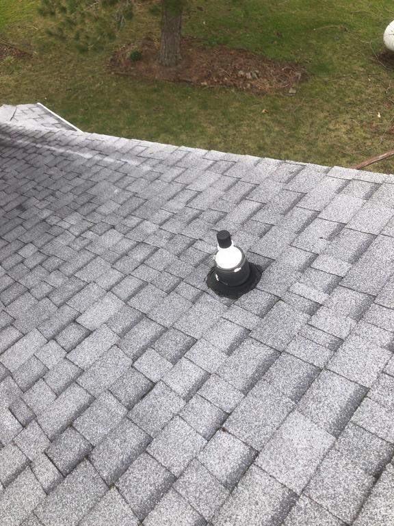 Storm damage roof replacement by Nitro Roofing and Construction