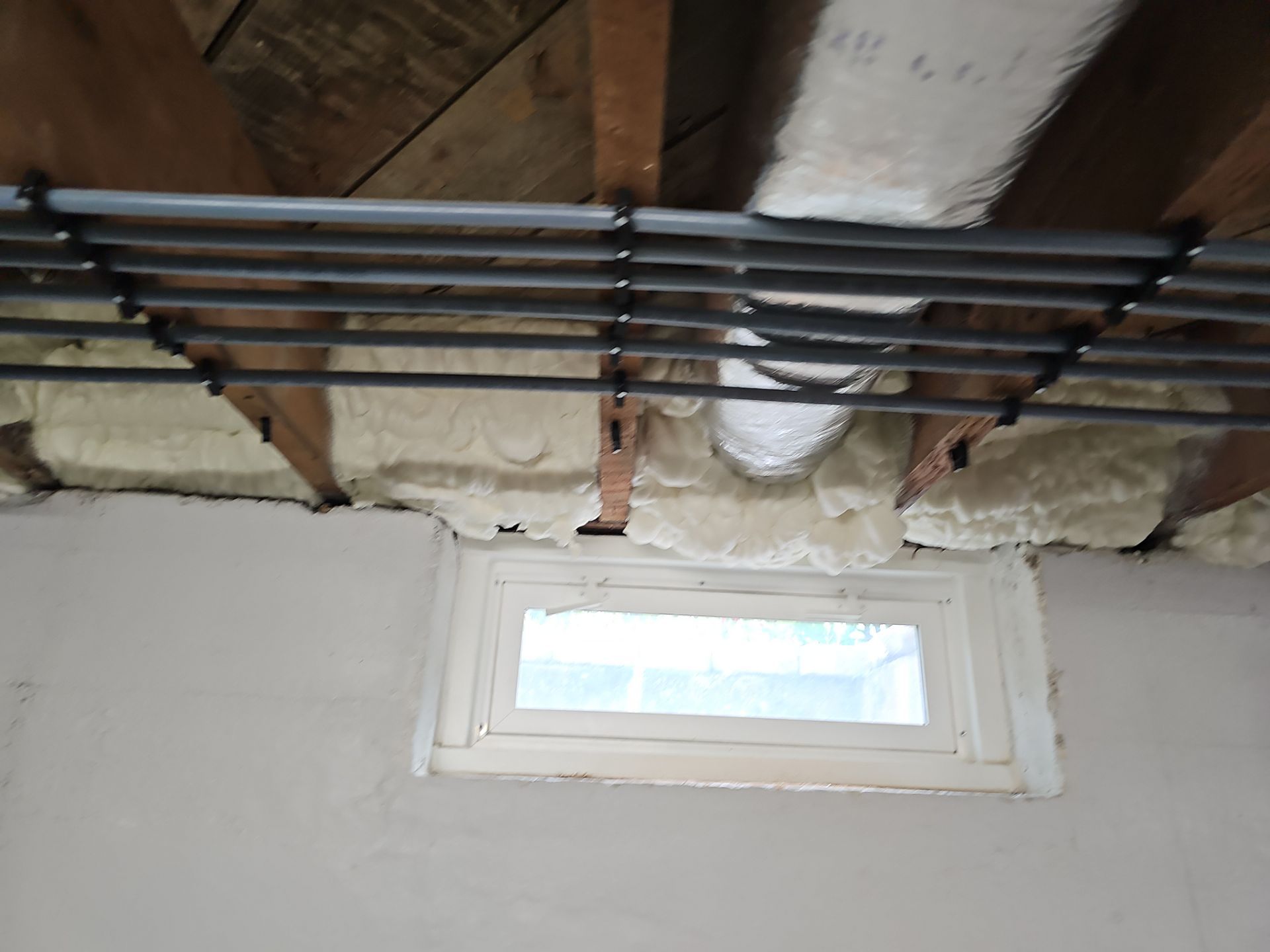 Attic Insulation using open cell spray foam by NYS Foam & Energy