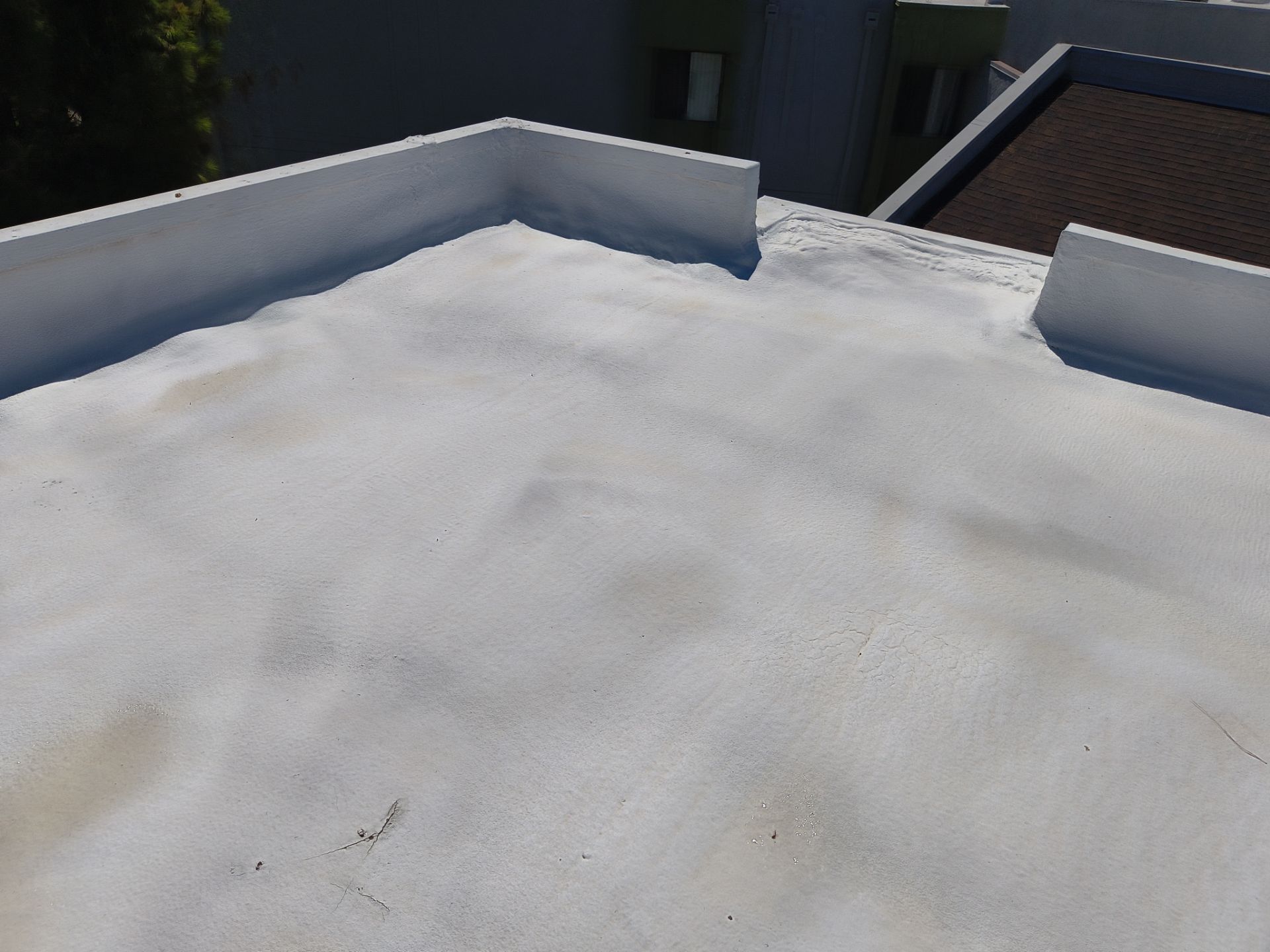Mesa Apartment Flat Roof Coating and Interior Restoration Services by APM Builders LLC