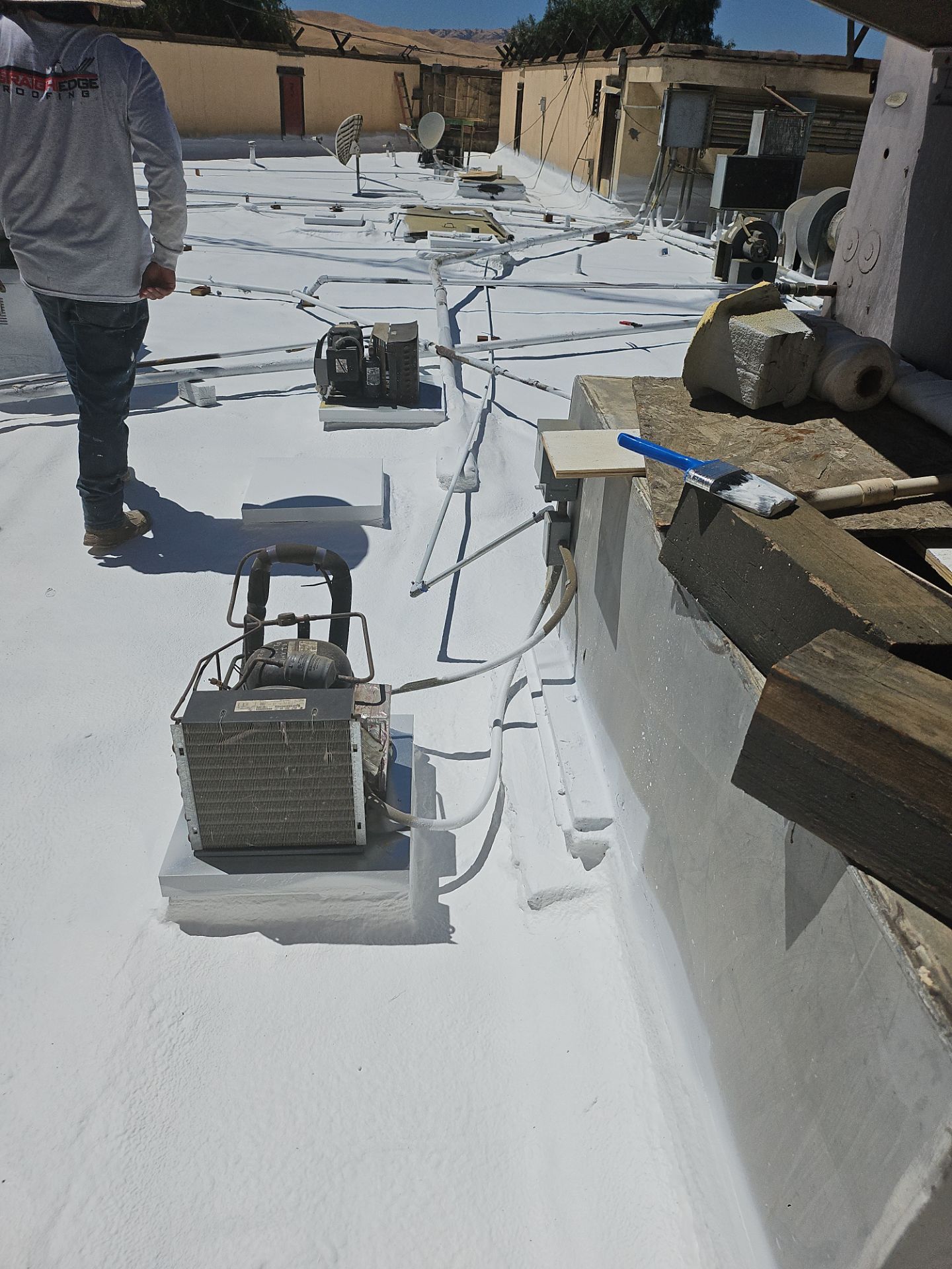 Spray foam and coatings using General Coatings acrylic coatings and spray foam by Straight Edge Roofing Inc