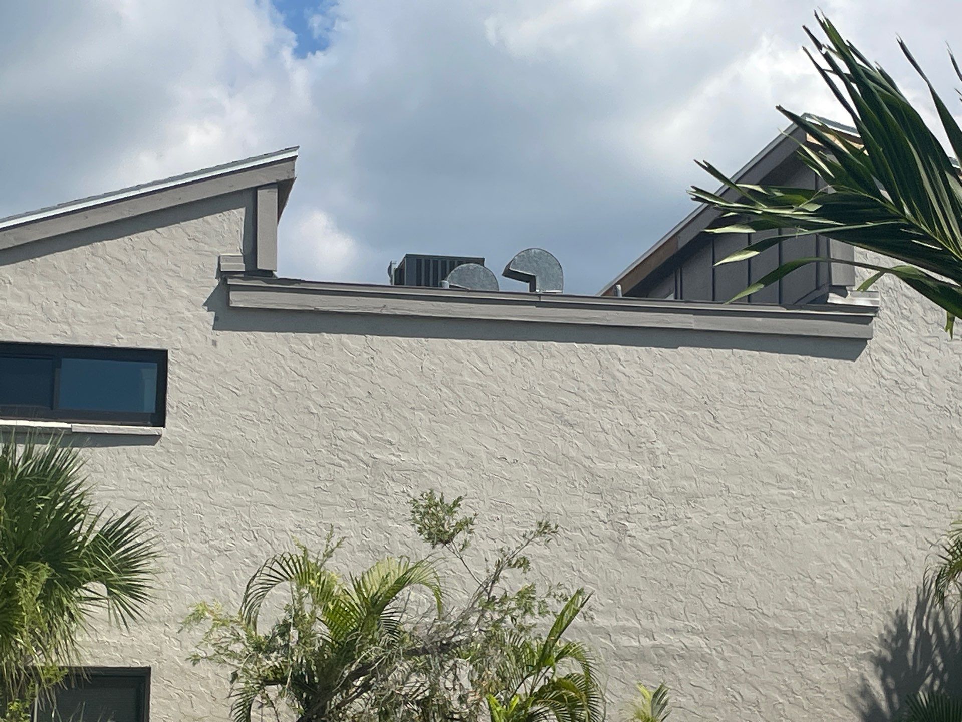 White Gutters Repair and Installation in Sarasota FL by Gutter Professors