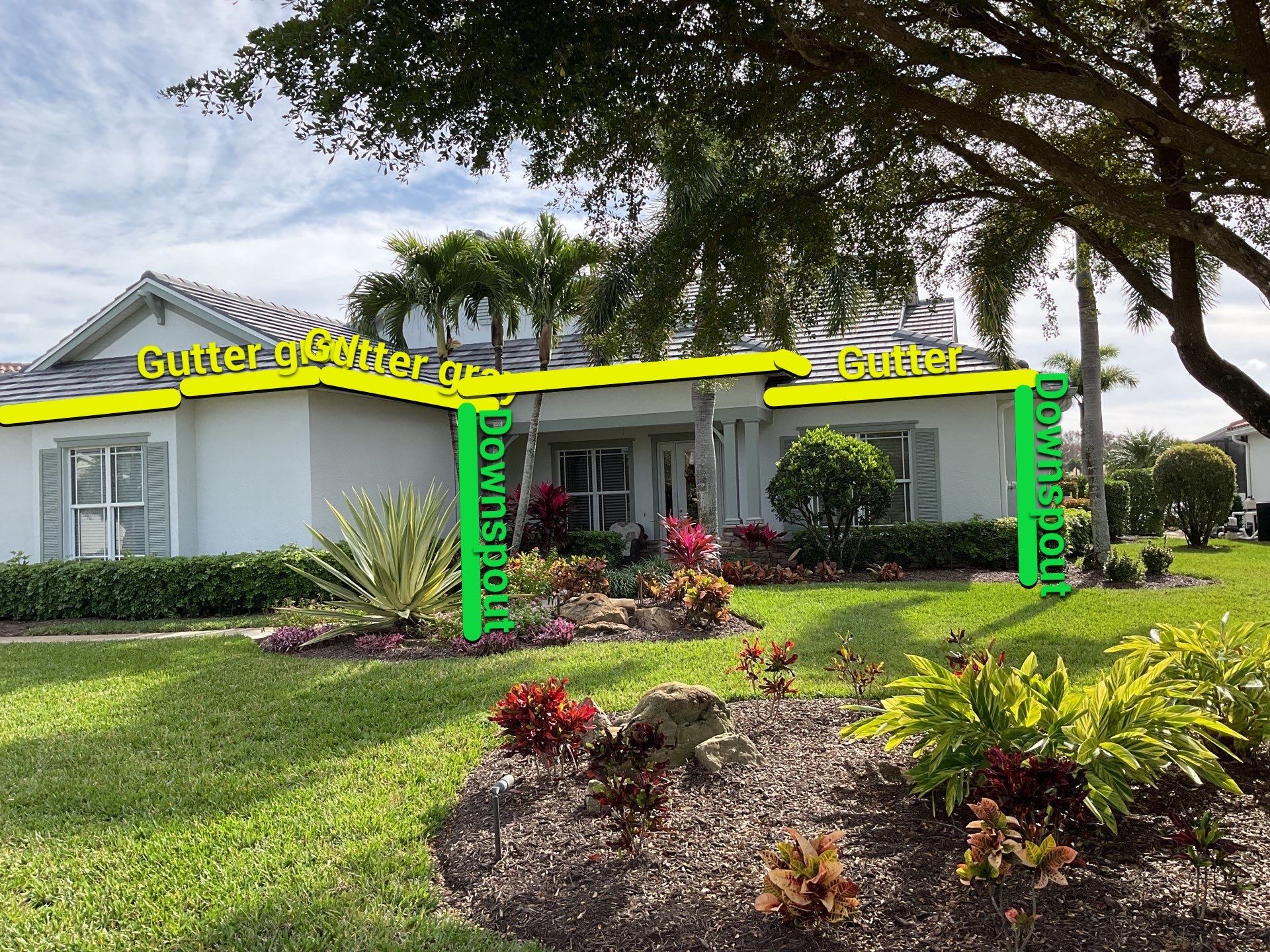 7-inch Grey Gutter Installation and White Downspouts in Fort Myers FL  by Gutter Professors