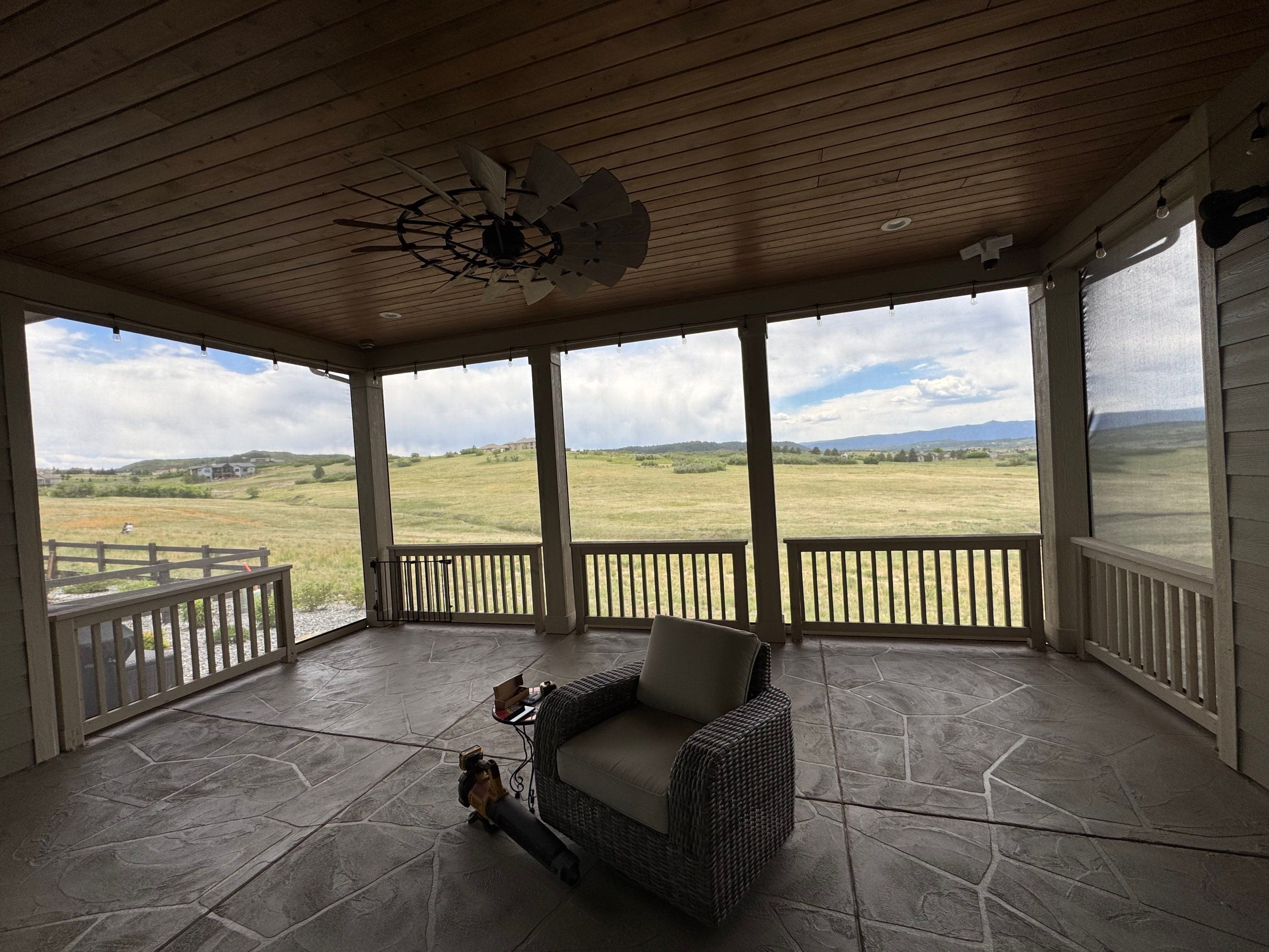 Exterior MagnaTrack Solar Screen Installation on Castle Rock Covered Patio by Outdoor Solutions Colorado