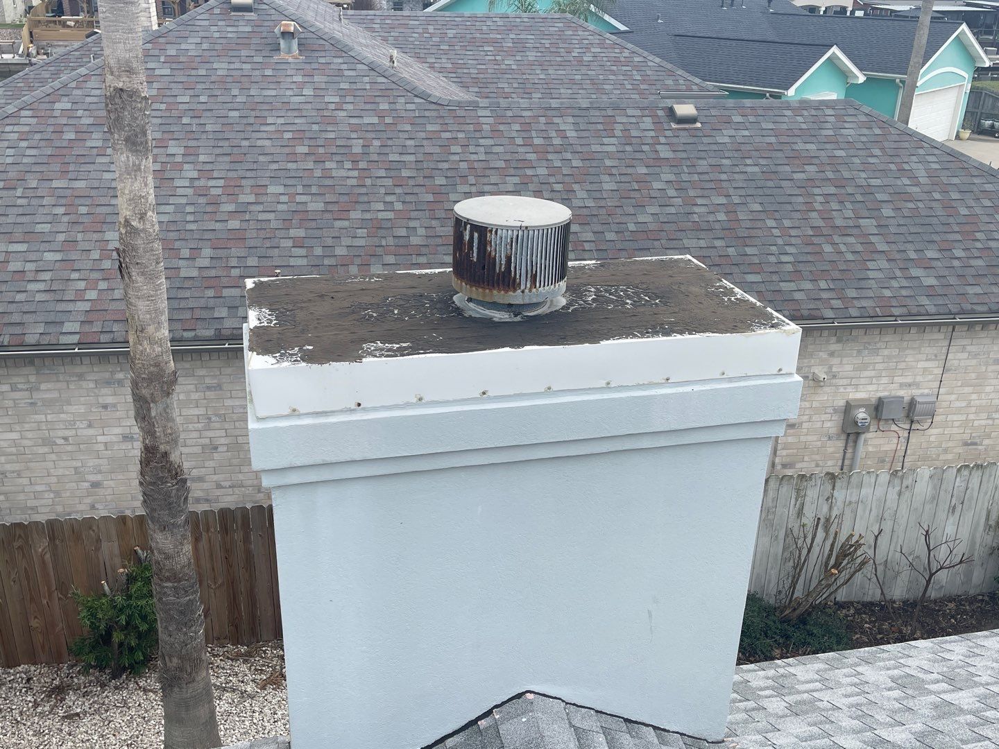 Residential Roofing Repair using Galvanized Chimney Cap & Chase by Lighthouse Roofing