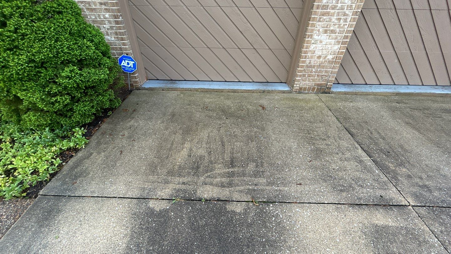 concrete patio and driveway cleaning by Northern Power Washing LLC.
