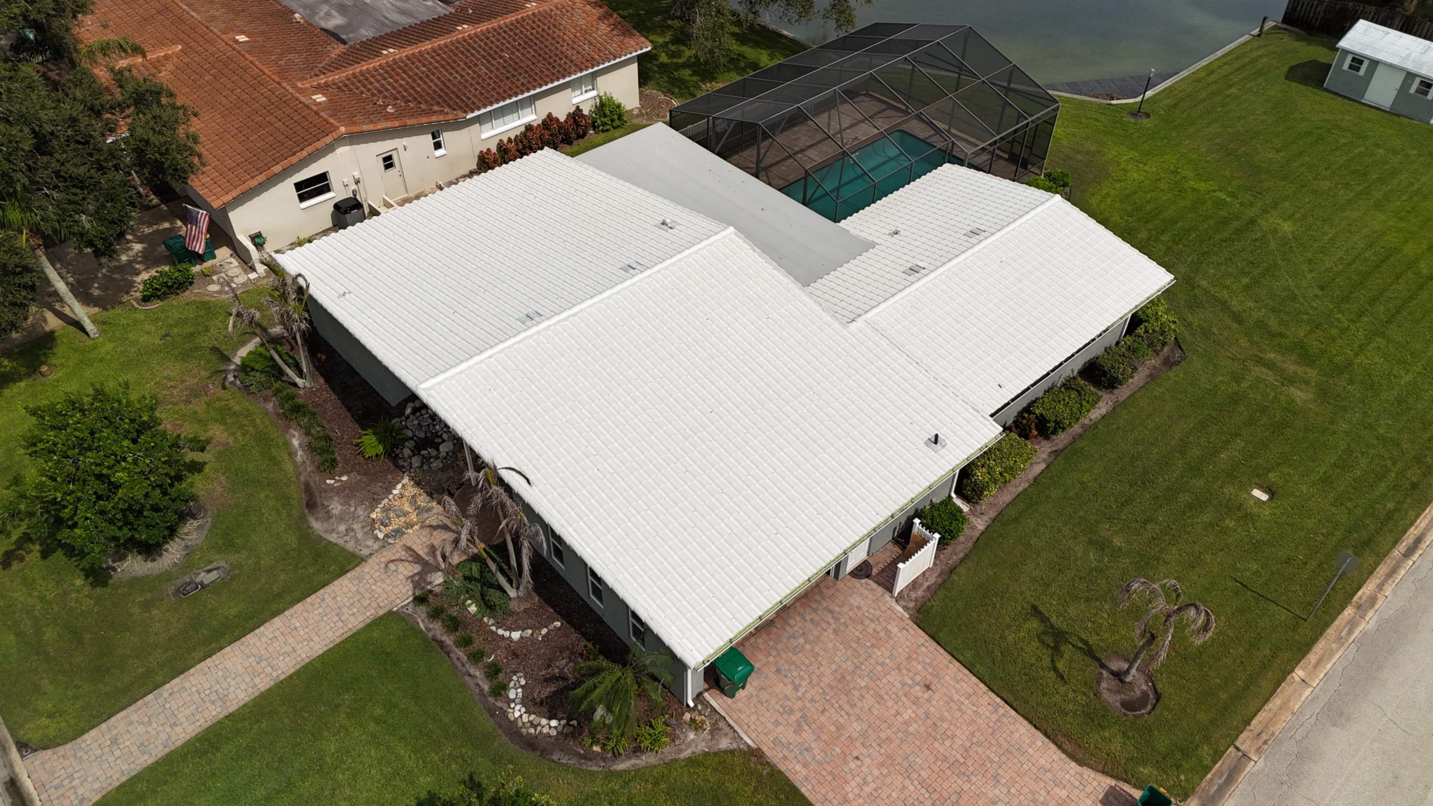 Comprehensive Concrete Tile and Flat Membrane Roof Replacement in Cocoa Beach by Wiedmann Construction & Roofing