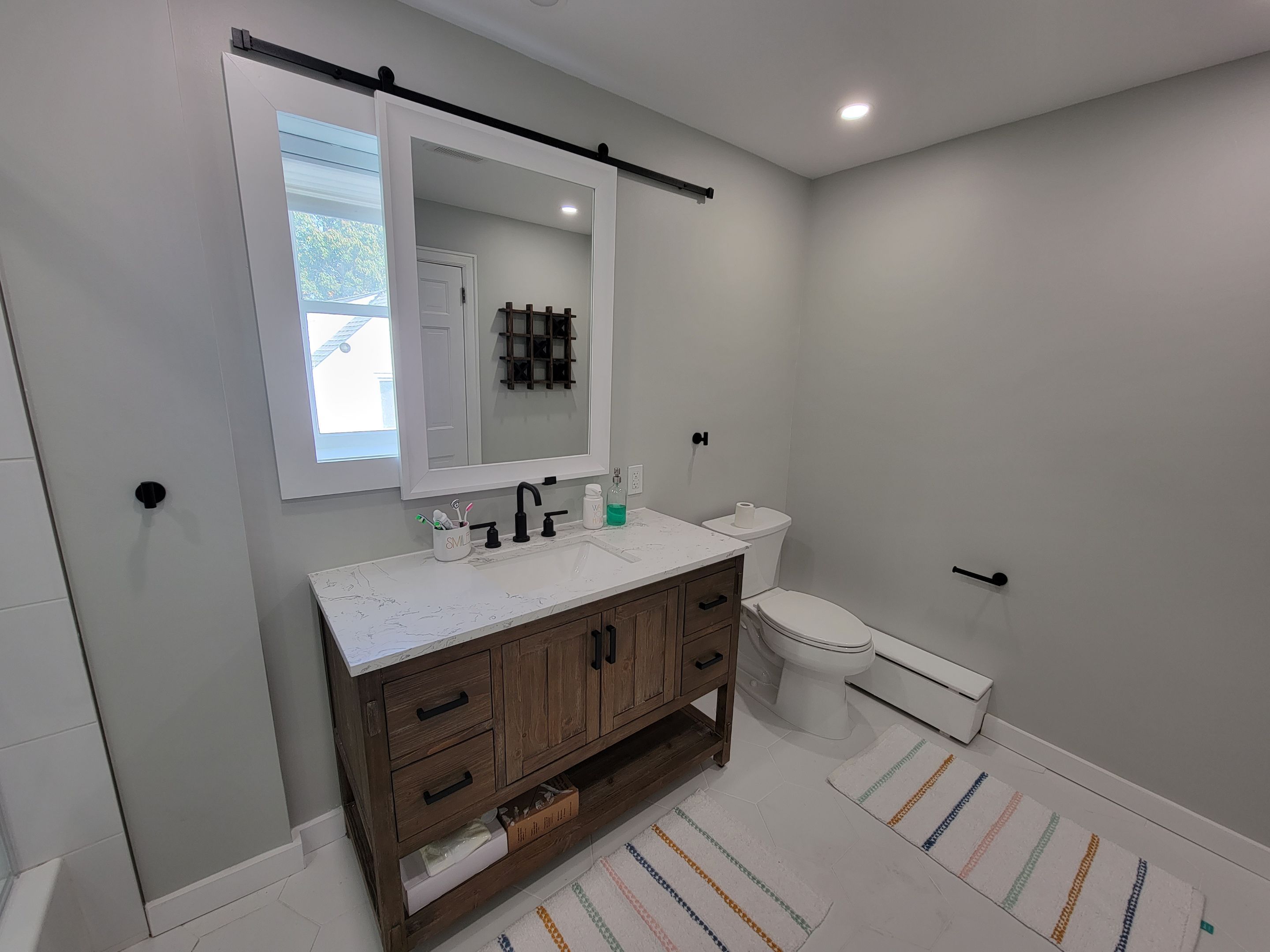 Kids bathroom Upgrade by Cedar Contractors Group, Inc.