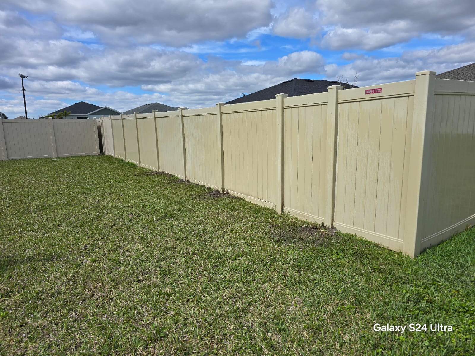 Tan Vinyl Privacy Fence Repair in Port Charlotte by True Fence LLC