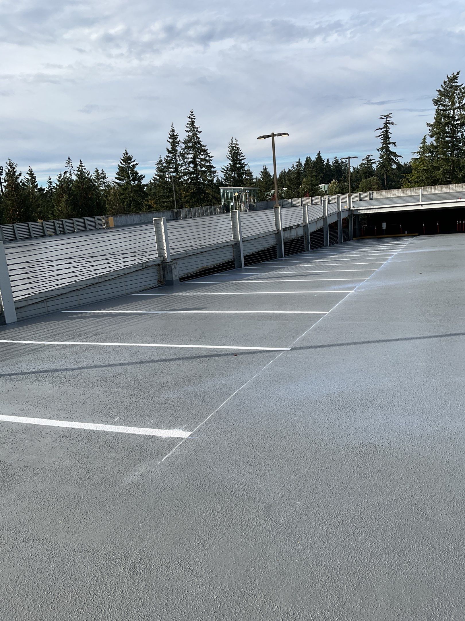 Corti Construction | Striping for Concrete Parking Lot by Jireh Asphalt & Concrete Inc 