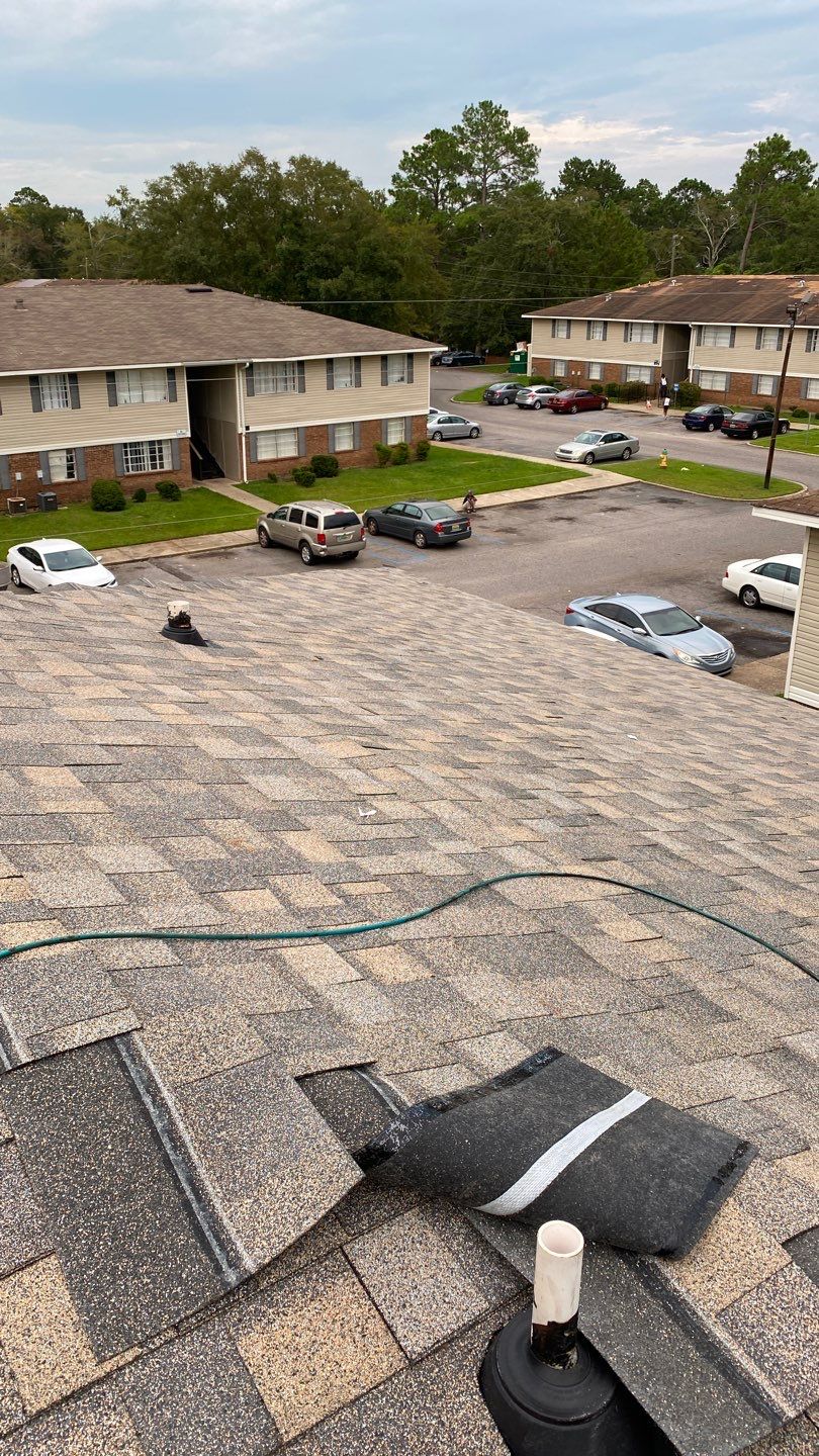 Commercial Roofing Installation using Roof Replacement by American Roofing & Construction LLC