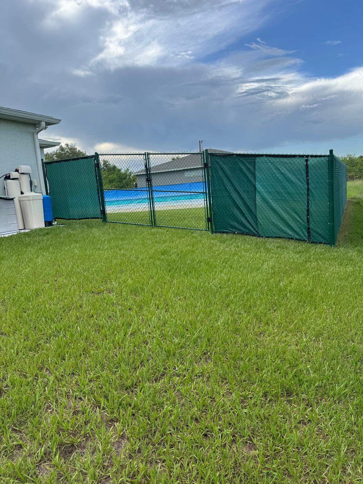 Chain Link Fence Installation with Custom Beach Privacy Screen in Port Charlotte by True Fence LLC