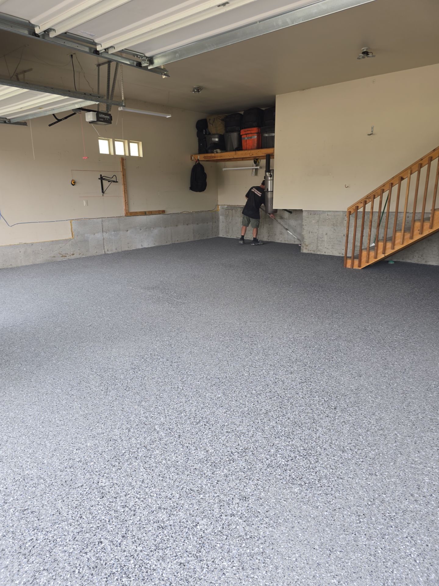 Custom Gray Speckled Polyaspartic Garage Floor Coating in Cheney by Croc Coatings, LLC