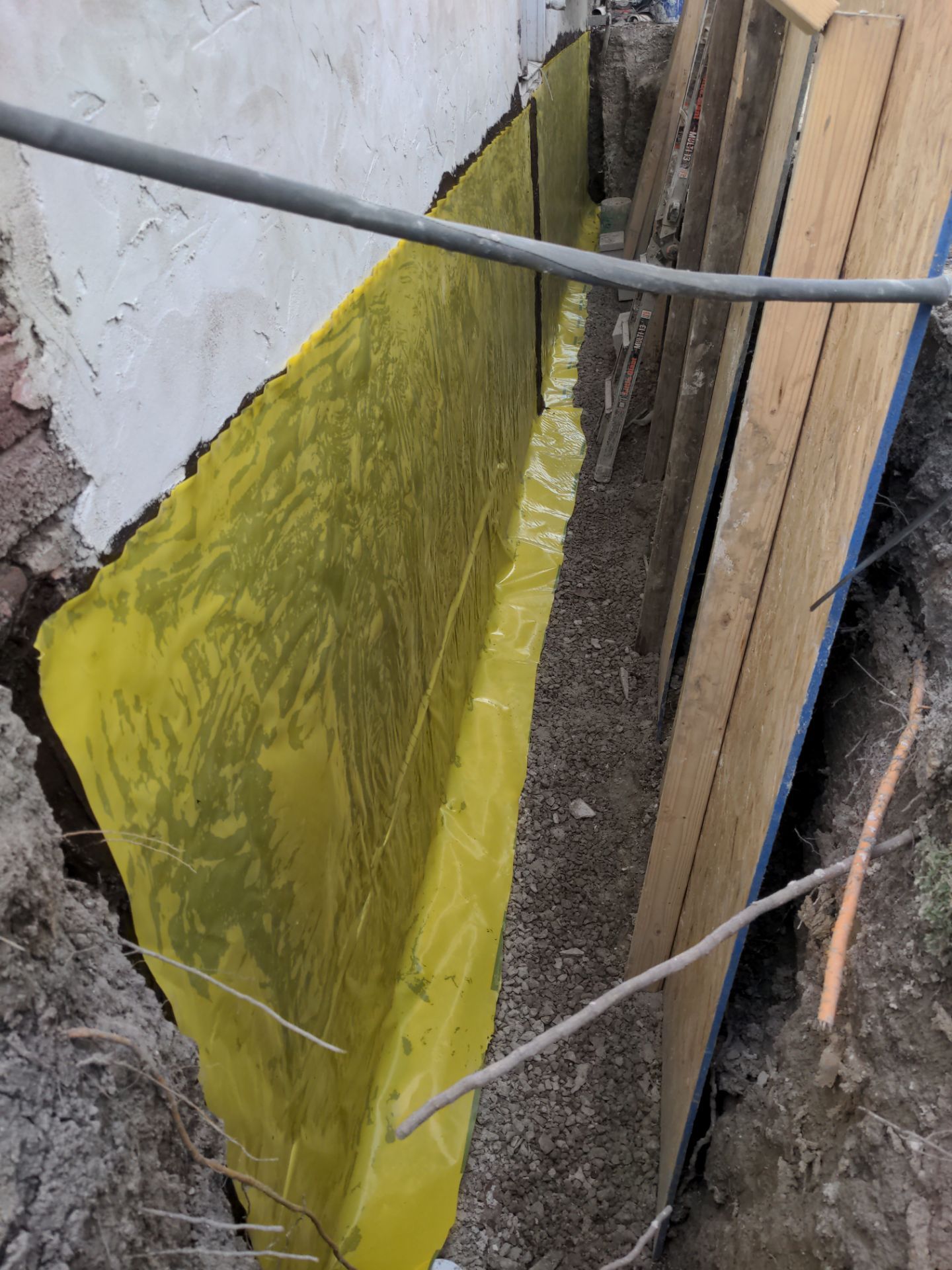 Basement Wall Rebuild with Exterior Waterproofing by Toledo Basement Repair
