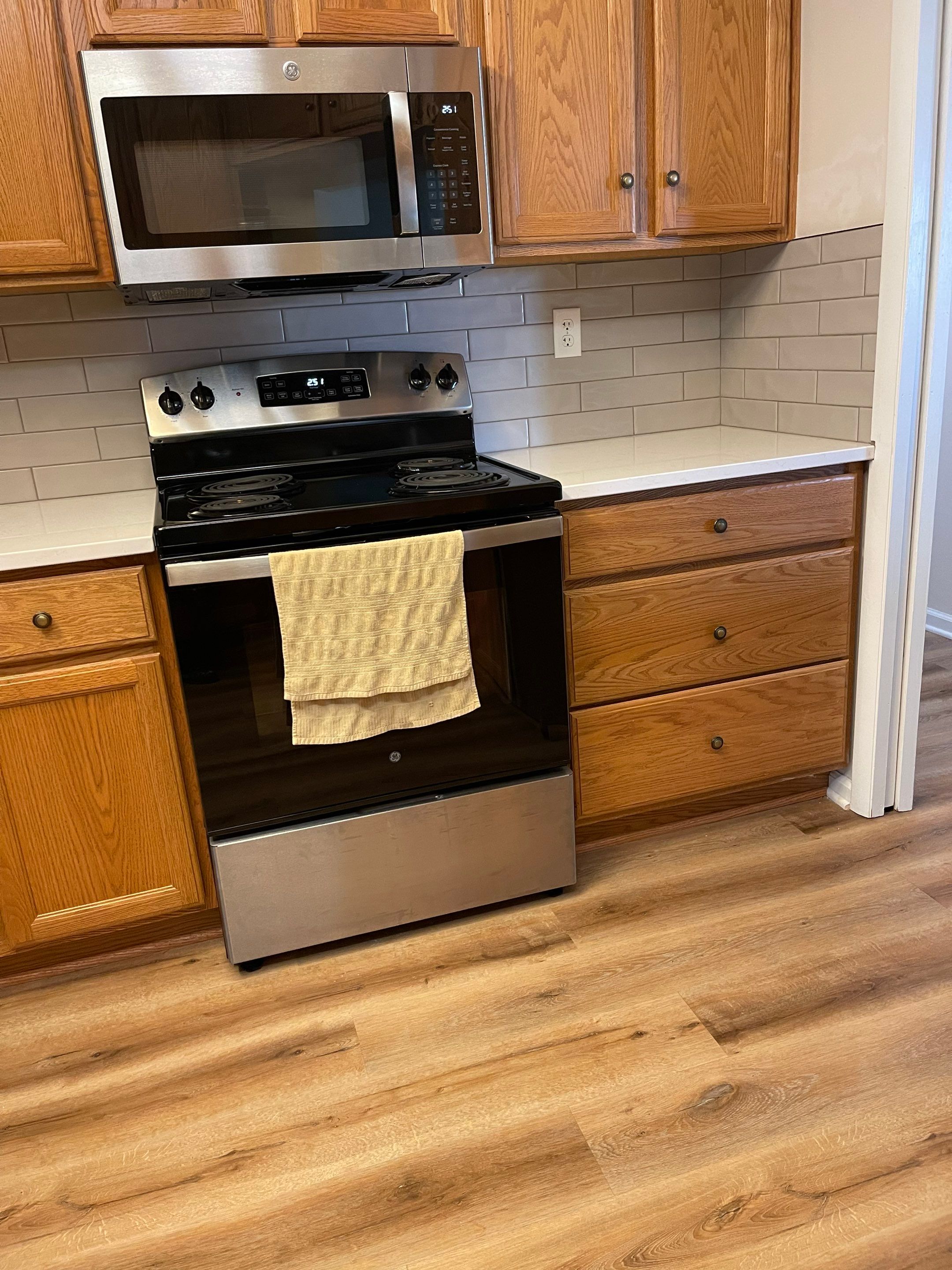 Carl Gray Kitchen by Integrity Tile and Home LLC