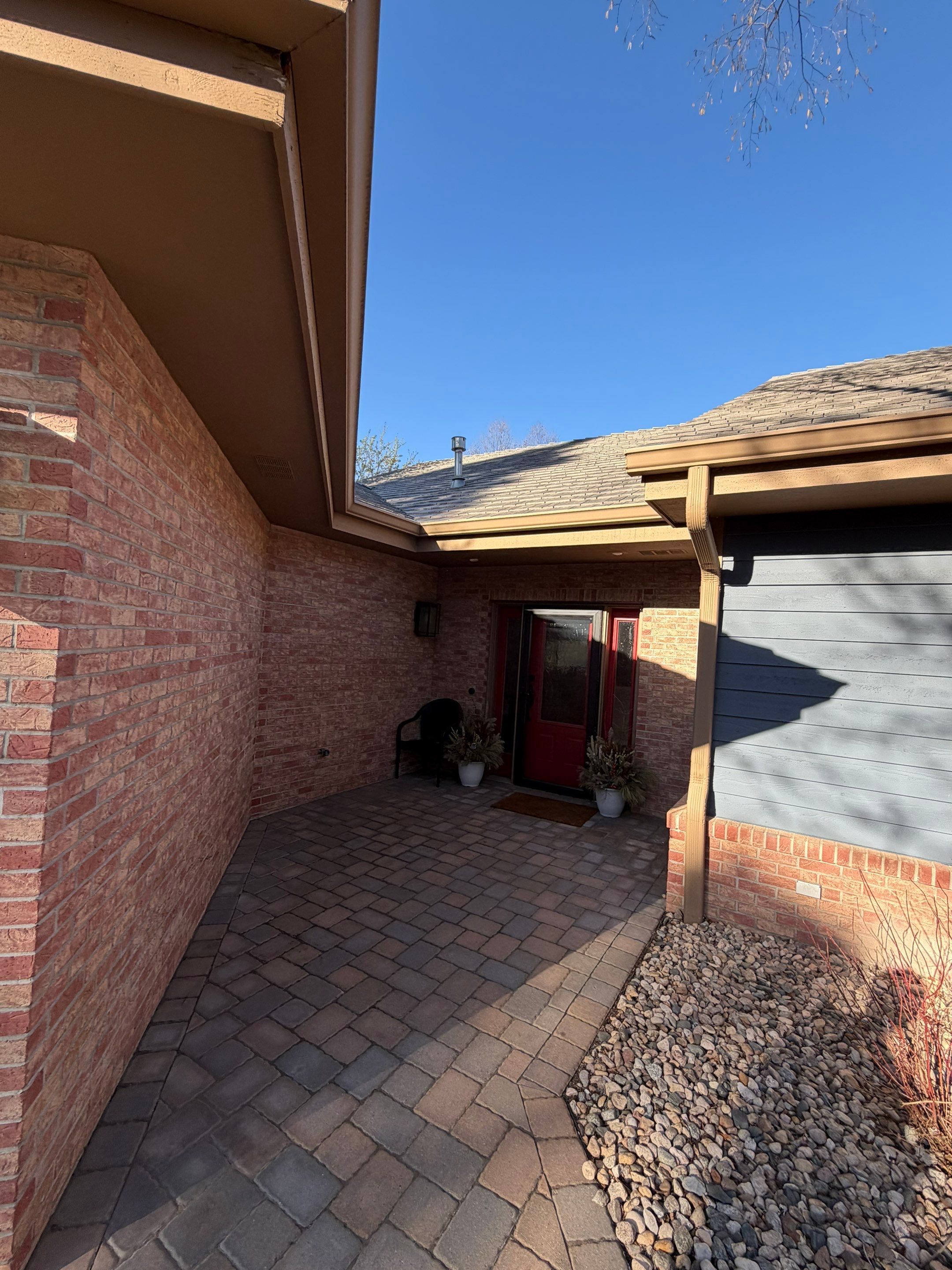 Residential Exterior Painting and Siding Refresh in Sioux Falls by Select Painting, Coatings & Garage Cabinets