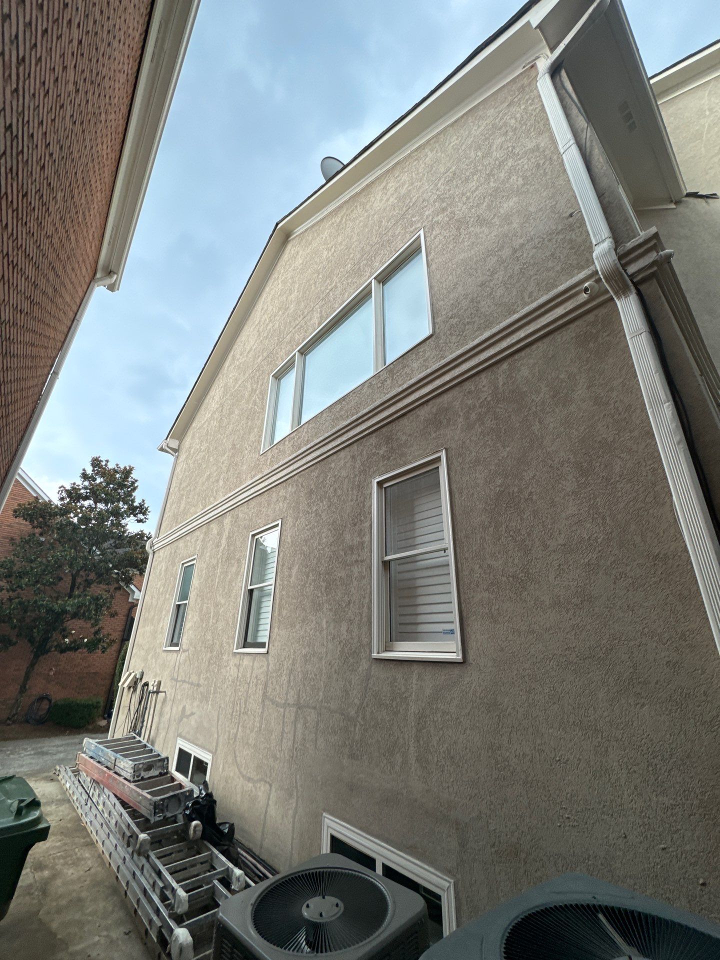 Full Exterior Stucco Painting and Wood Deck Staining in Atlanta by Swift Home Renovations
