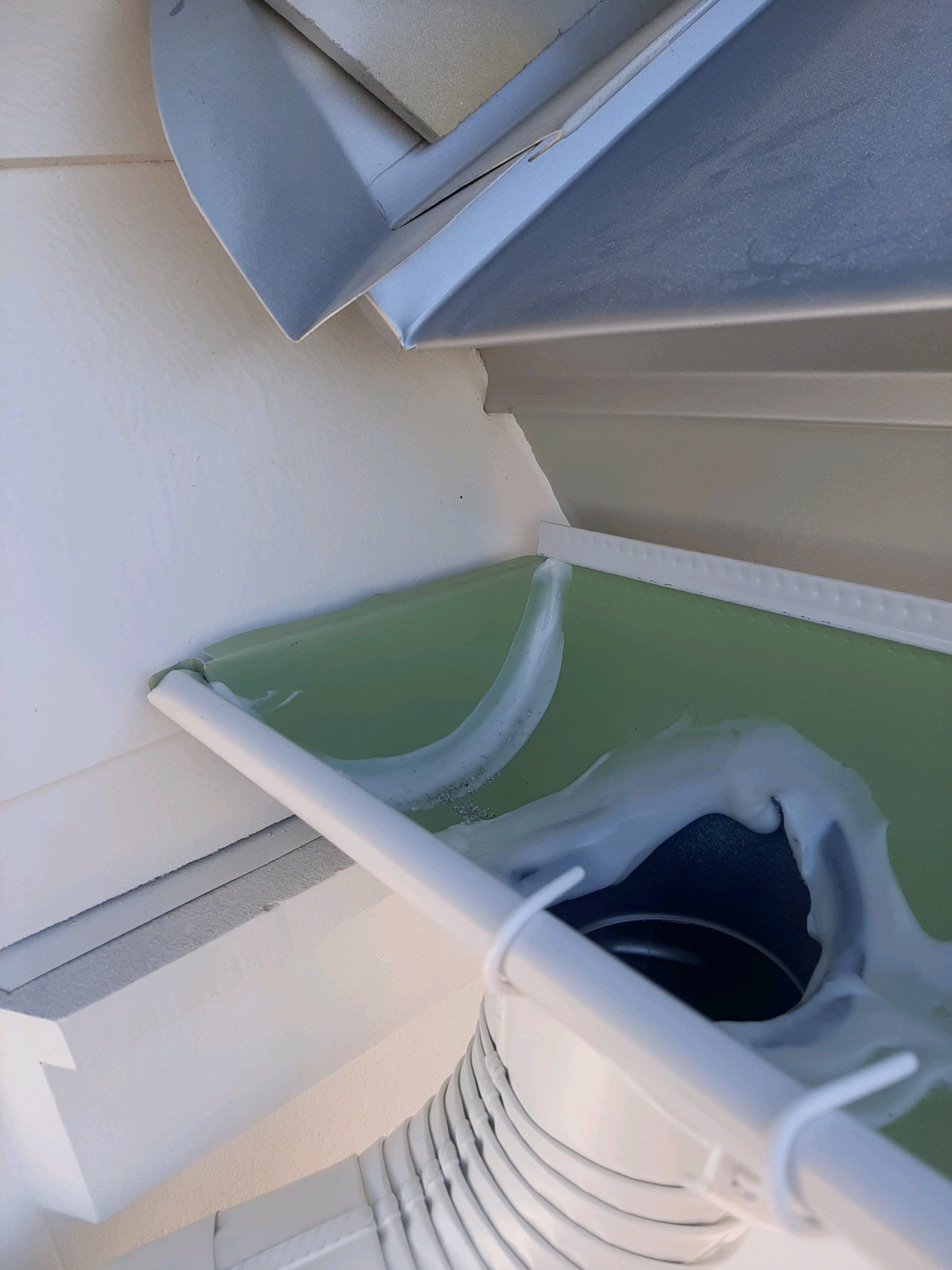 Gutter Installation Using 6 Inch Seamless Aluminum Gutters by Gutter Professors