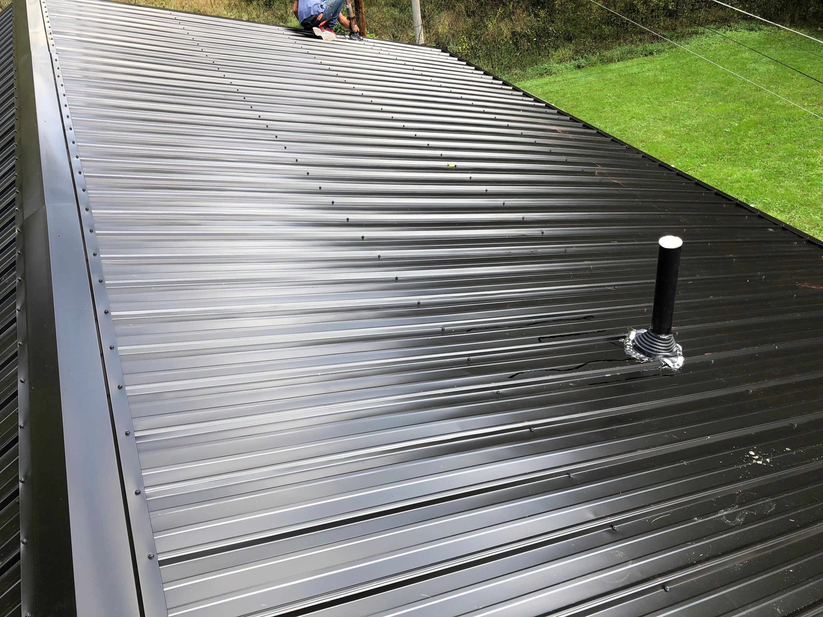 Metal Roof and Vinyl Siding, Soffit, Gutters using LifeTite Premium metal roofing  by Secure Construction Company Inc
