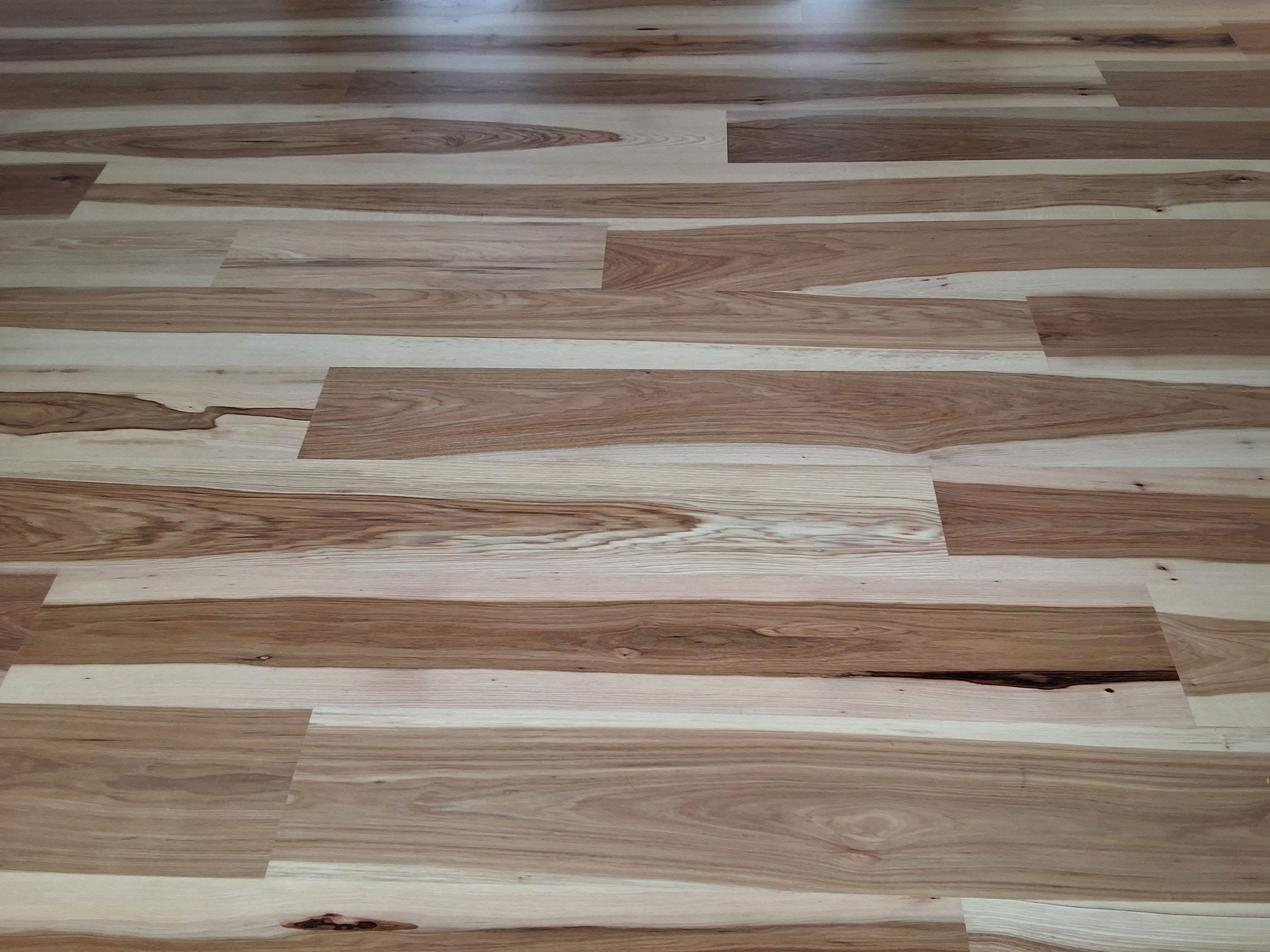 Wide plank natural calico hickory by Ann Arbor Hardwoods 