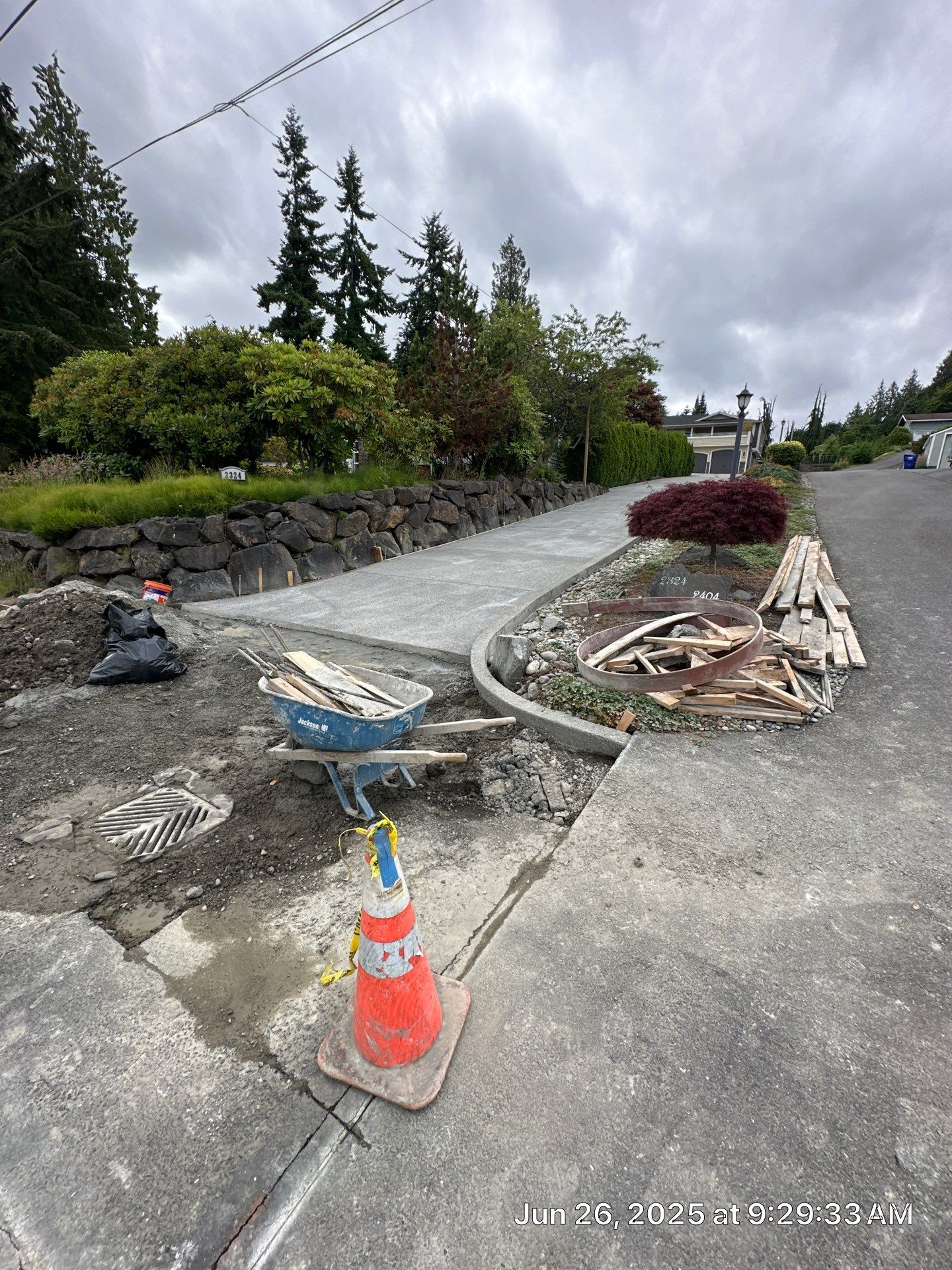 Concrete Driveway Makeover w/ Asphalt Patch | Everett  by Jireh Asphalt & Concrete Inc 