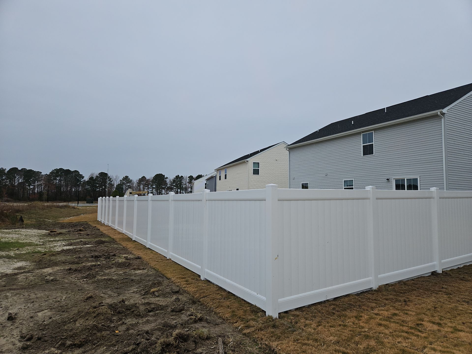 A Perfect Fence for a Brand-New Home by Tidewater Fence