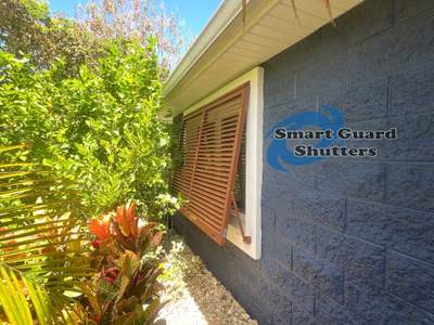 Impact Rated Bahama Shutters in Beige Brown