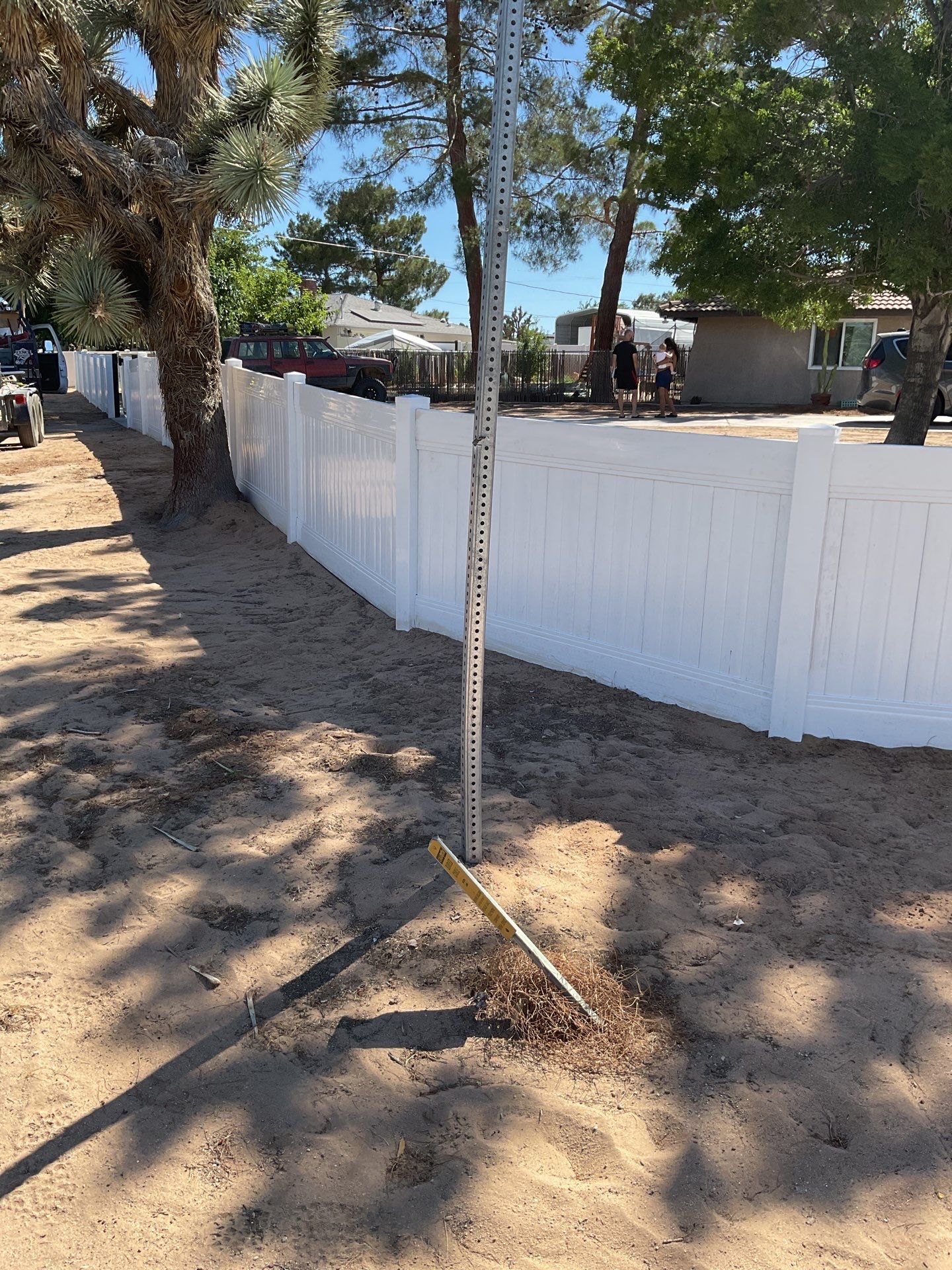 4ft White Vinyl Fence with Solar Power Motorized Gate by Fence Guys Inc.
