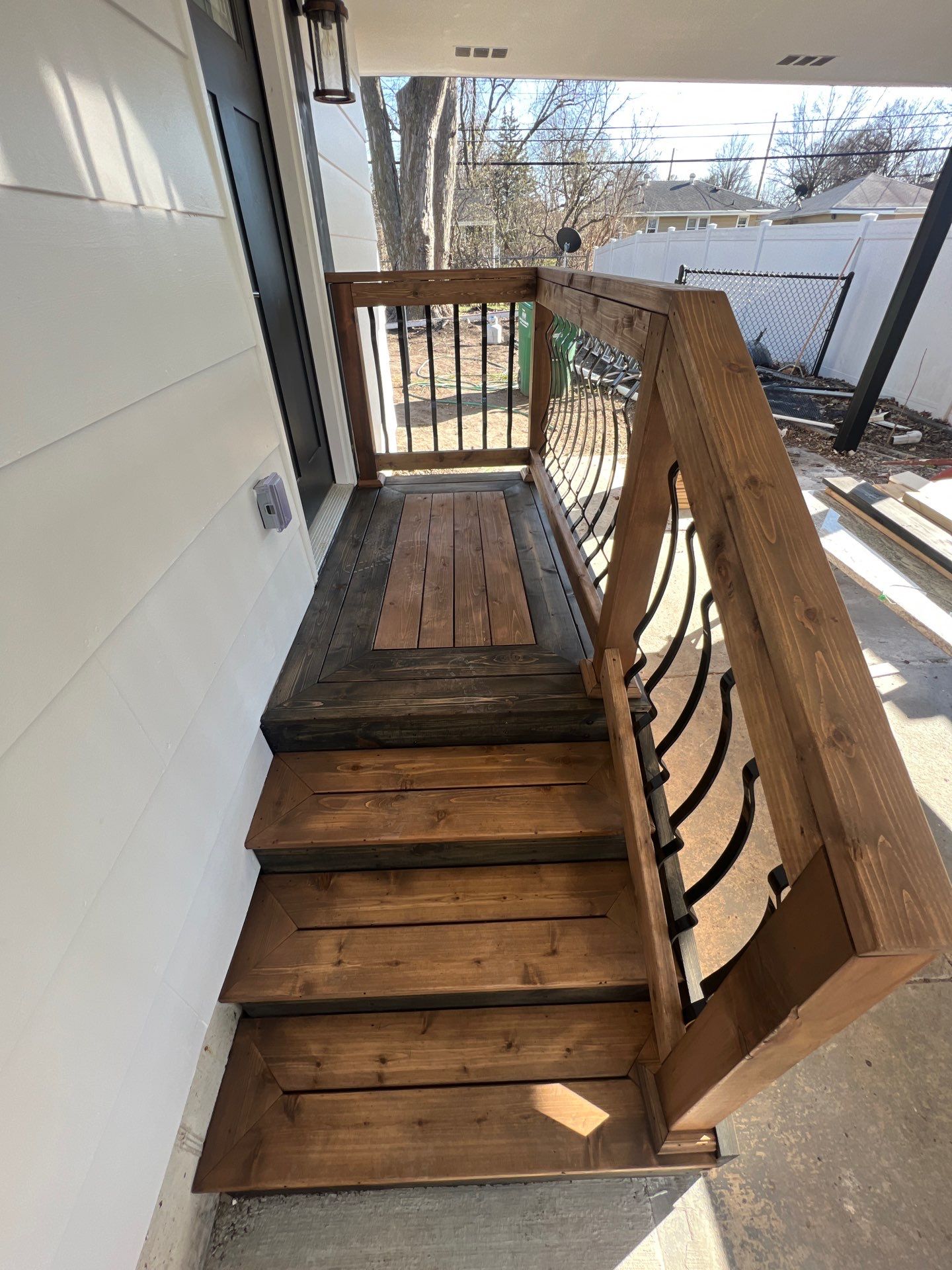 Deck re stained  by Cutting edge painting 