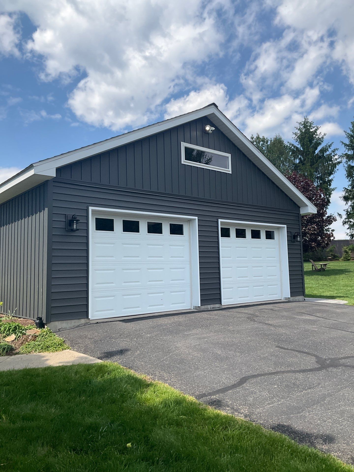 Nightfall Exterior Siding Replacement and Stone Veneer in Halifax by Esh Builders