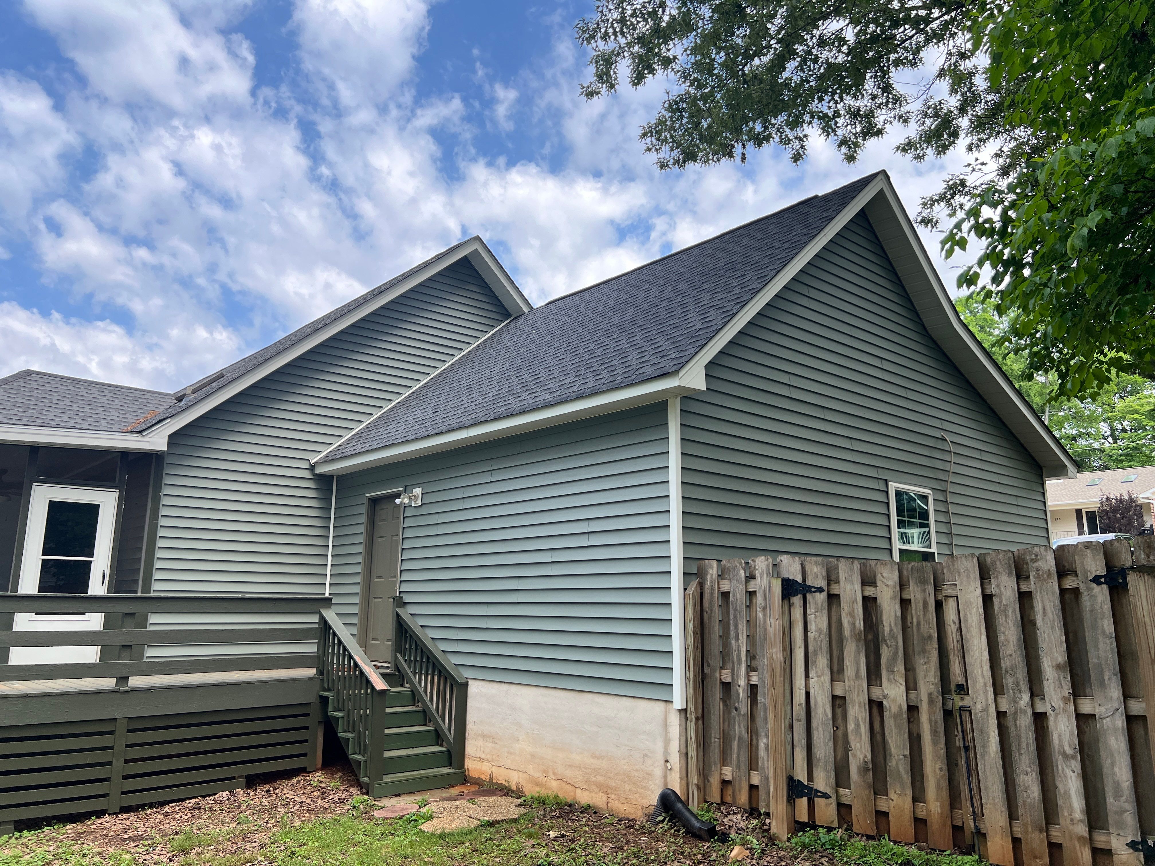 Siding Replacement using Mastic Carvedwood Vinyl Plank by Freedom Exteriors