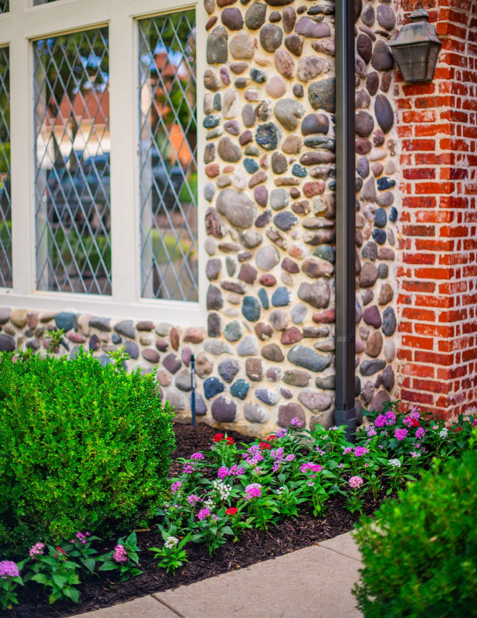 Southern Charm: Revitalizing a Cottage Garden by Complete Exterior Solutions