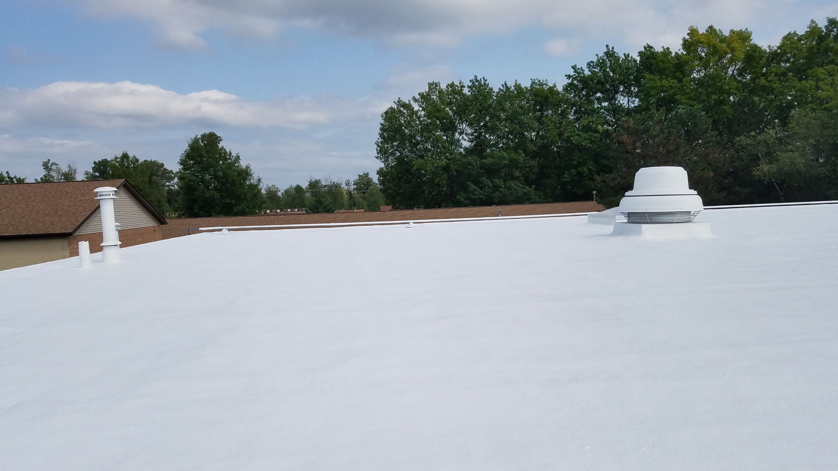 Spray Foam Roof System by Gold Star Roofing LLC 
