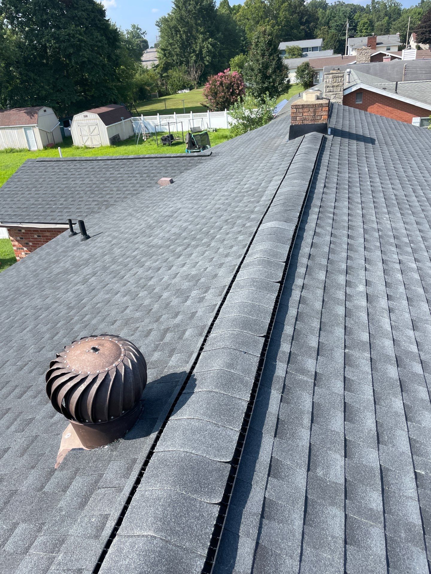 Residential Roofing Installation using GAF Timberline HDZ Charcoal by Rainstoppers Roofing