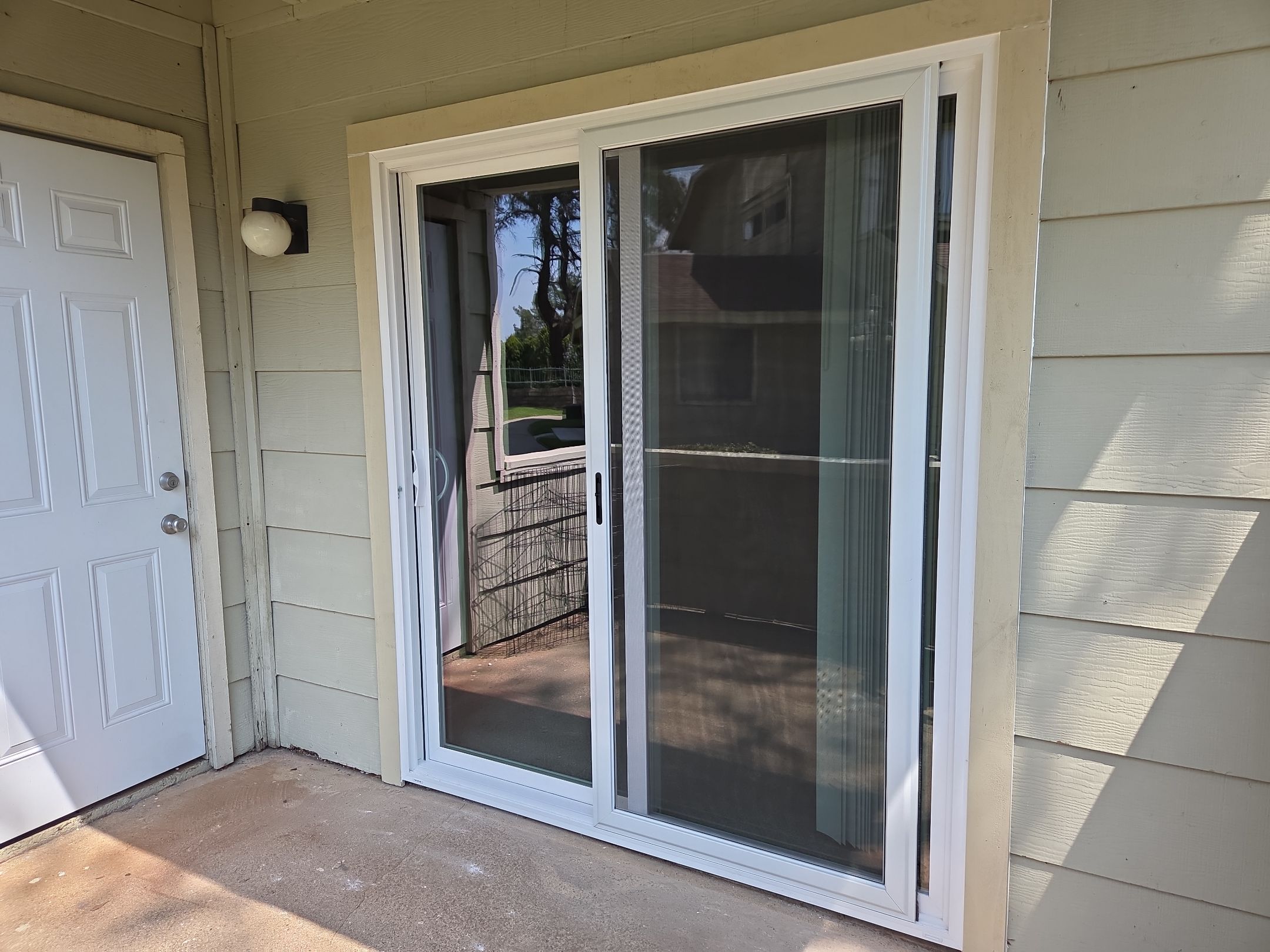 Patio Door Replacement in Apartment units by American Window Company