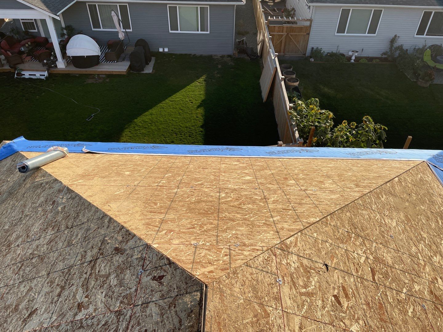 Residential Roofing Installation using IKO Weatherwood shingle by Top Notch Roofing Inc